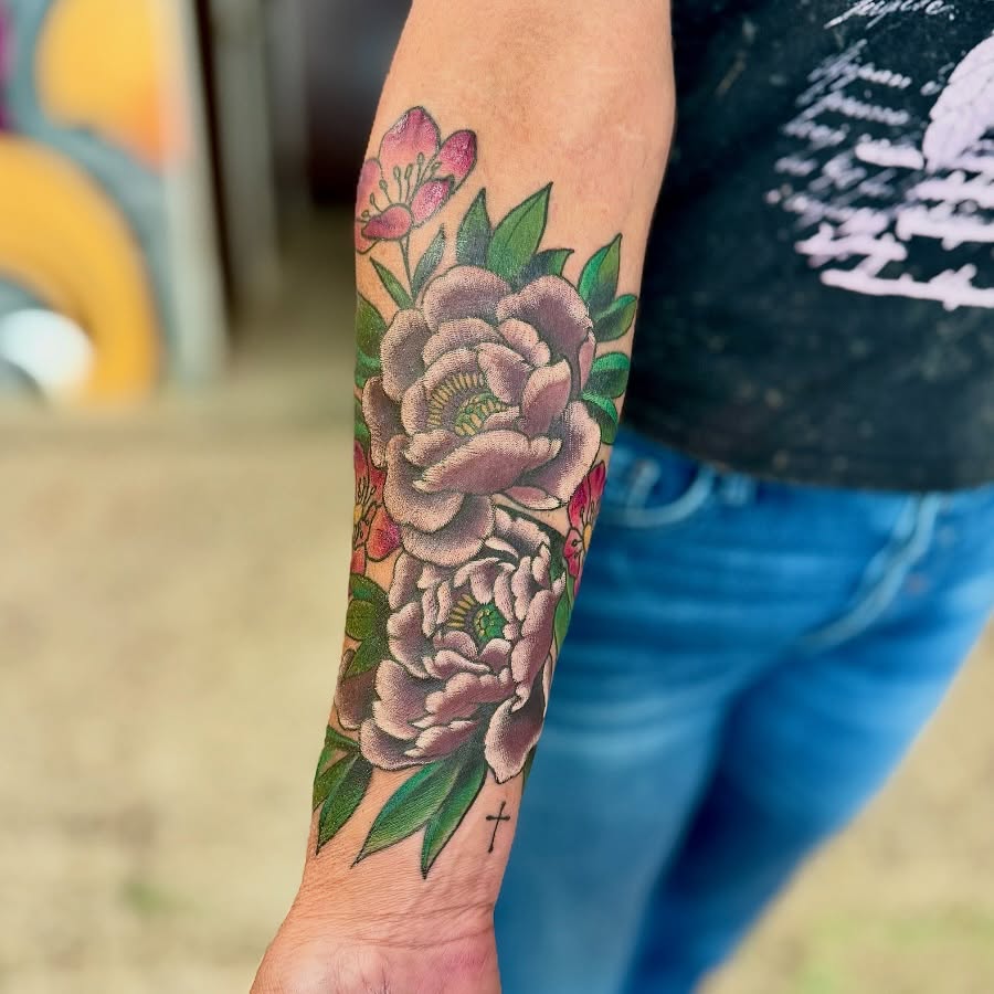 Peony flowers American traditional tattoo on the forearm by Jamie Hall, Kansas City, Missouri
