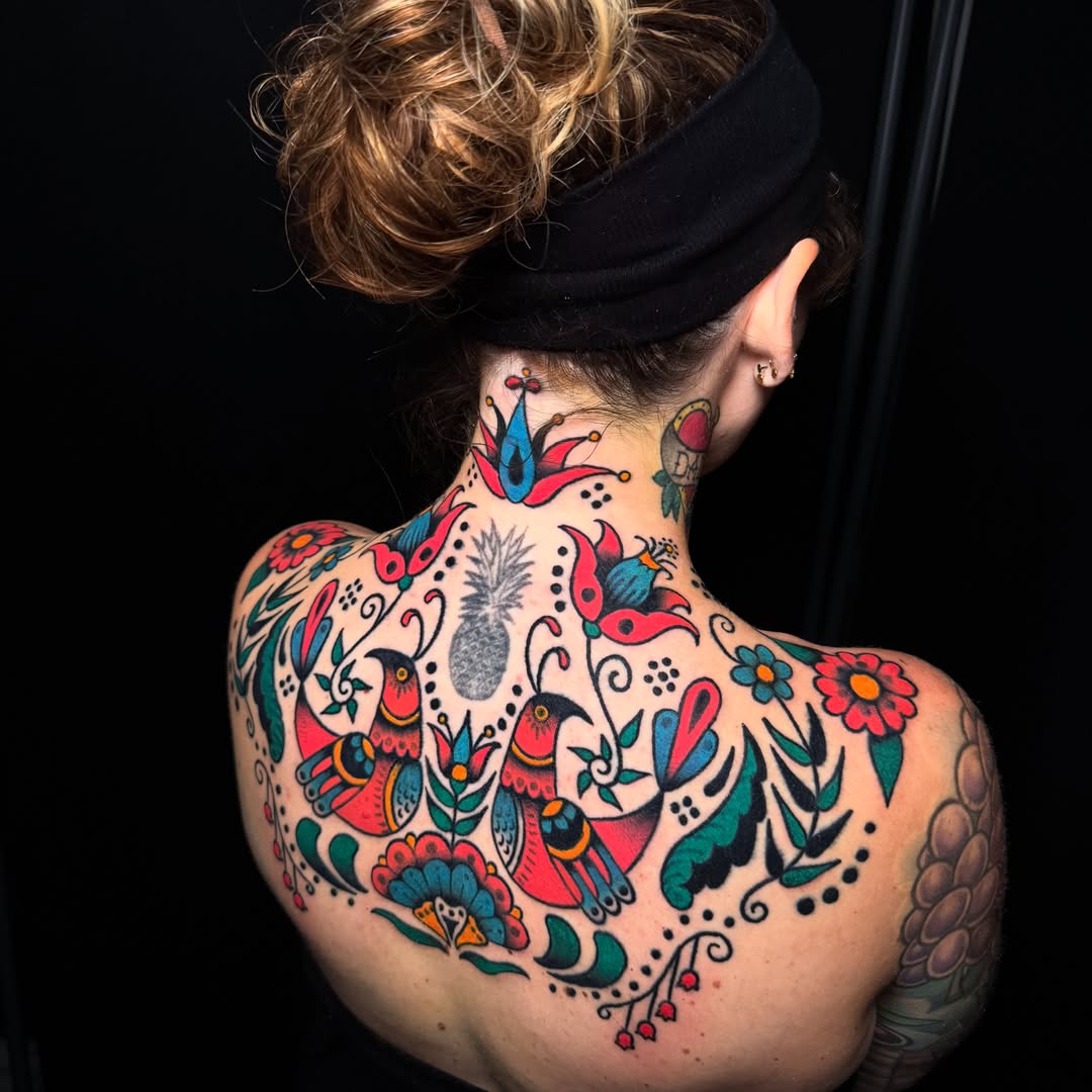 Birds and floral patterns American traditional tattoo on the back by Nate Masi