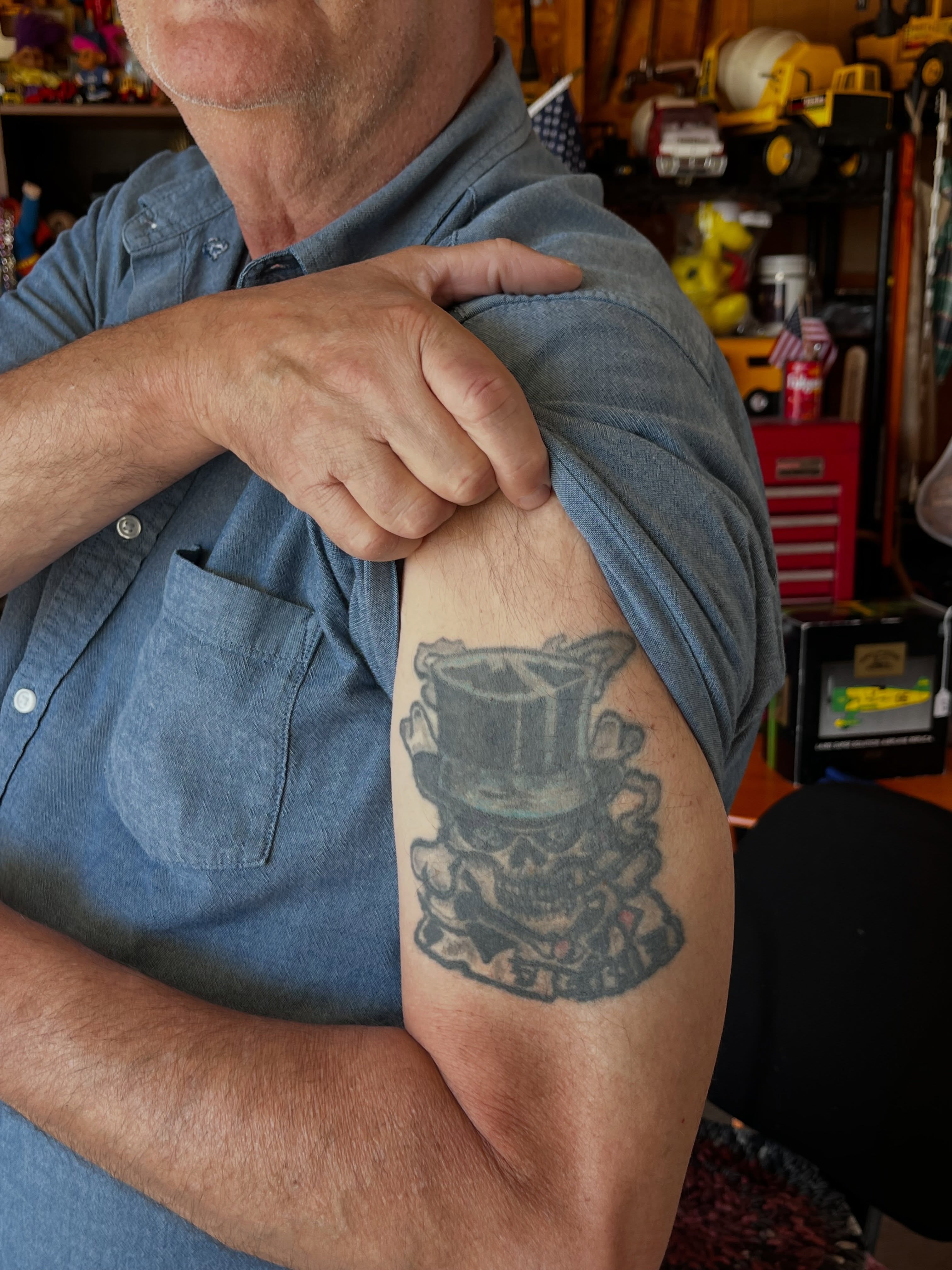 Skull wearing top hat black and grey tattoo on the forearm by Gap⋆head