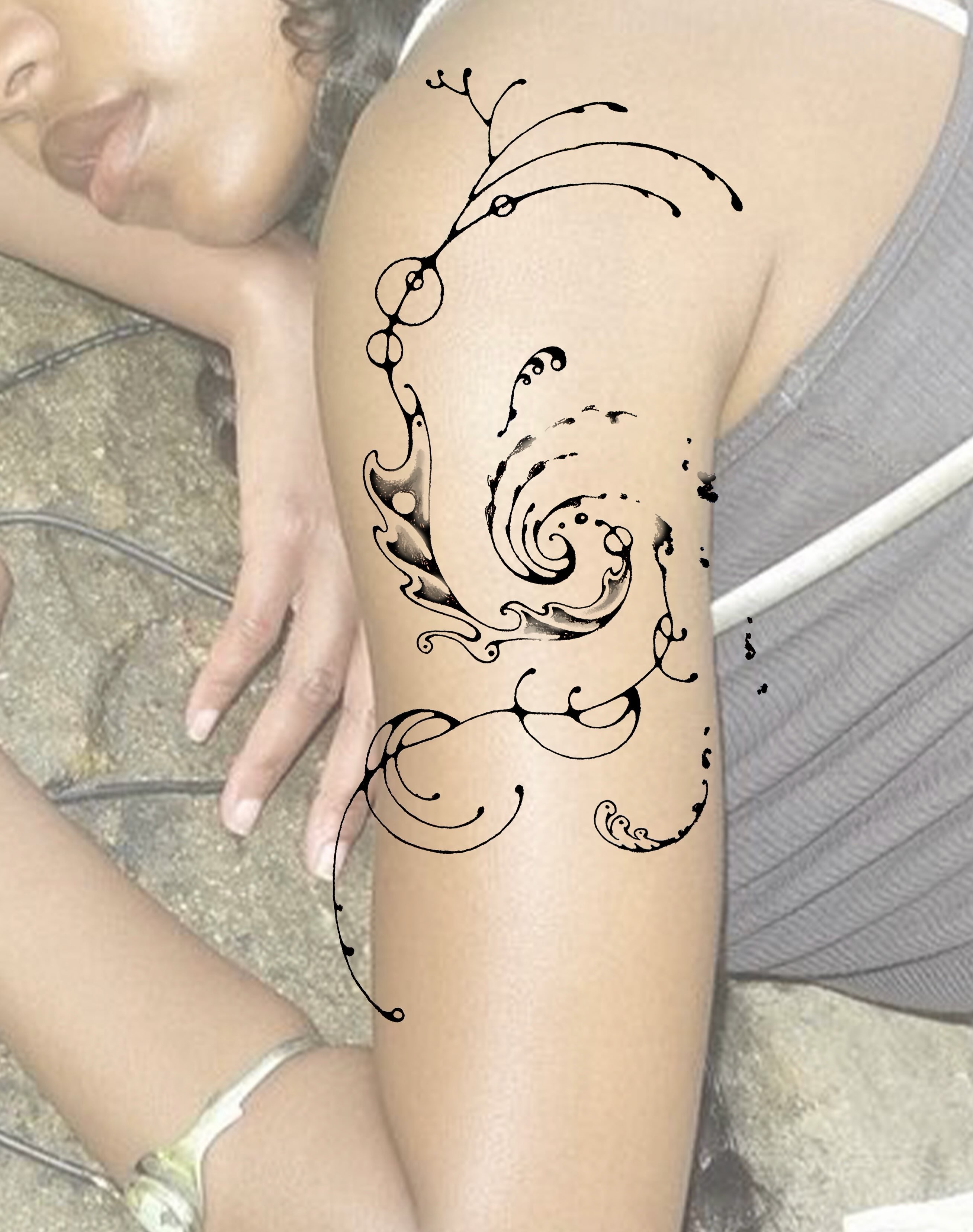 Swirls and branches ornamental tattoo on the thigh by thalia