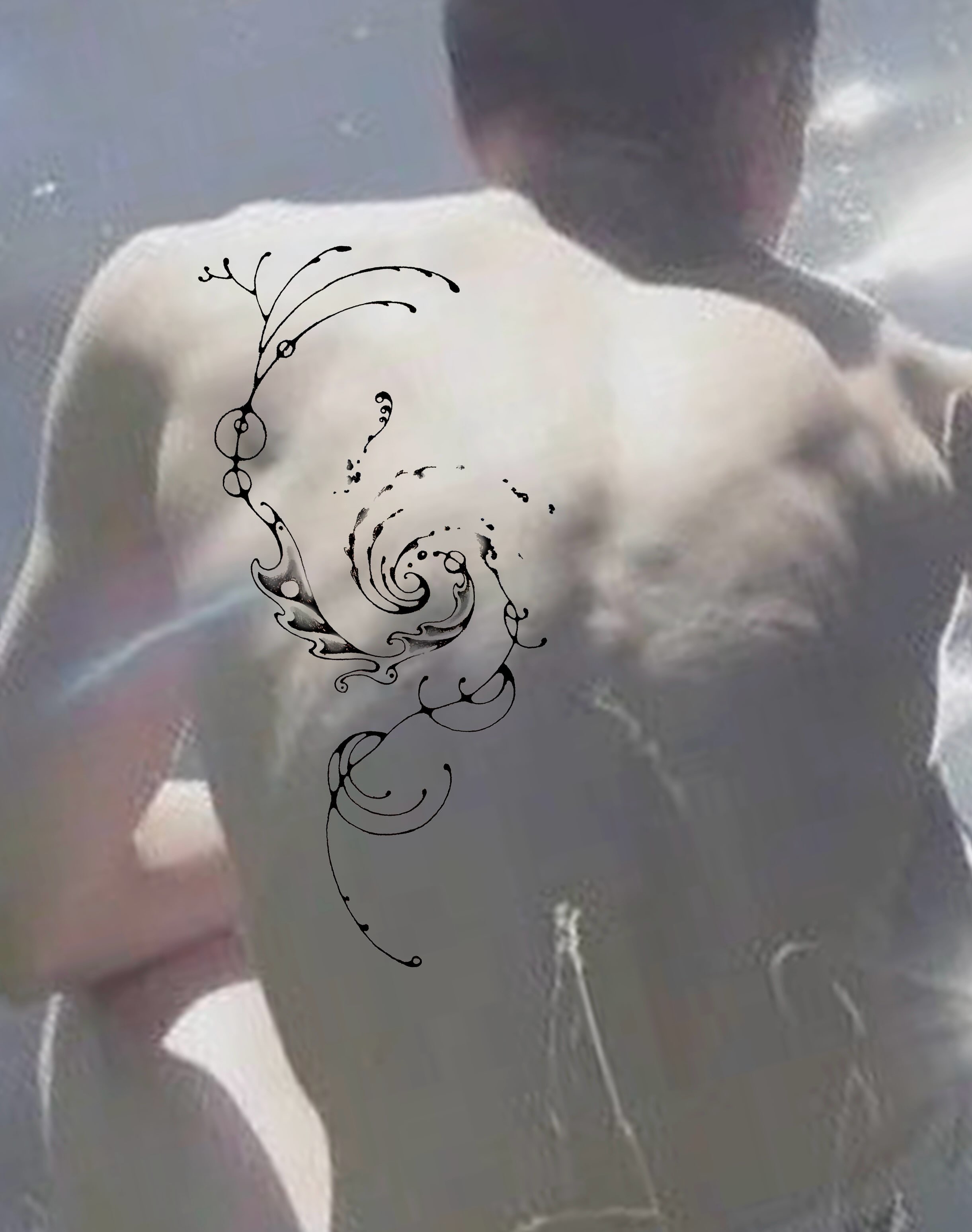 Swirl ornamental tattoo on the back by thalia