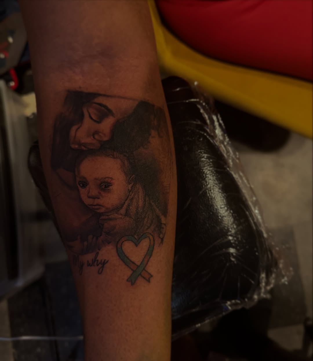Mother and child realism tattoo on the forearm by Lamb, Philadelphia, Pennsylvania