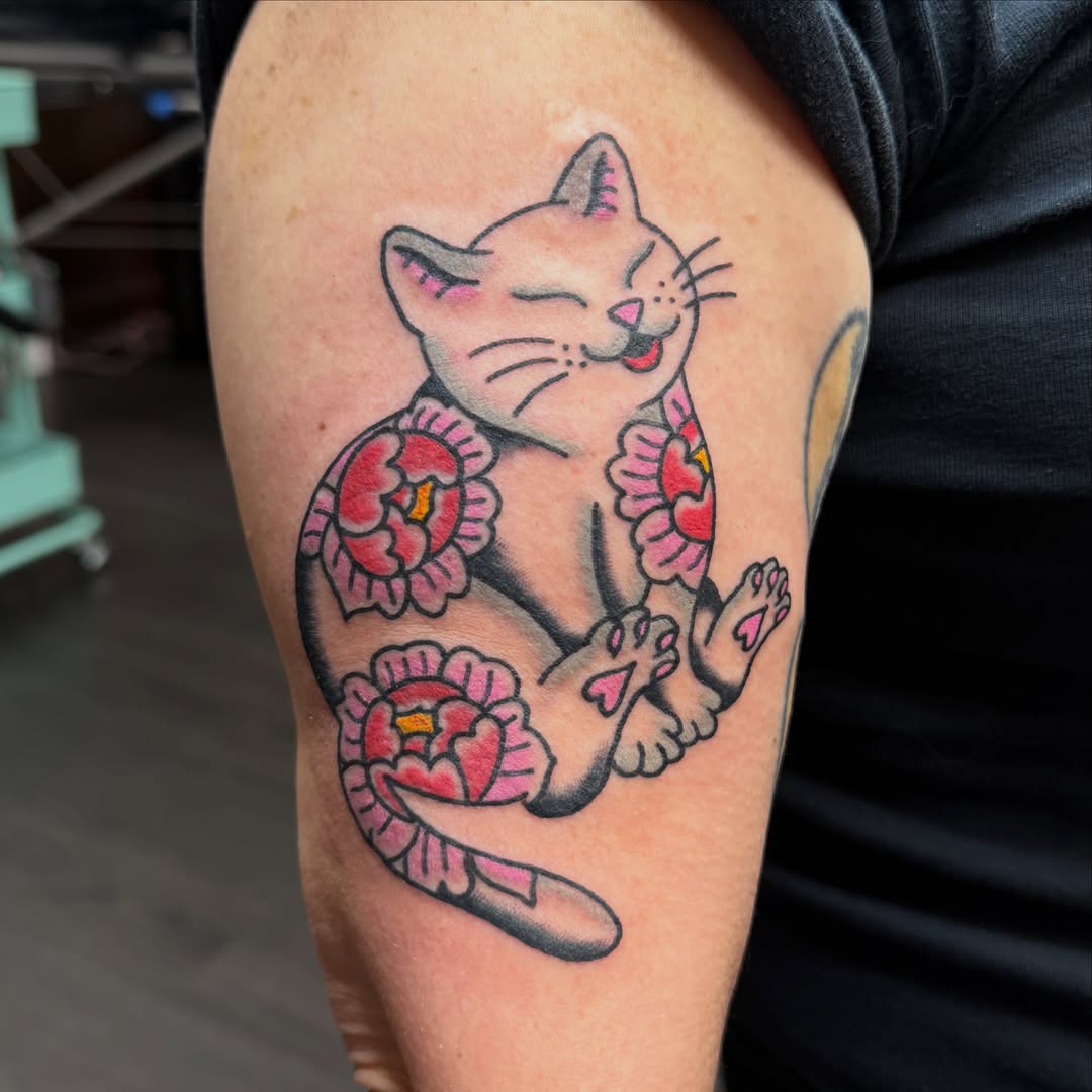 Cat American traditional tattoo on the forearm by Carl Testi