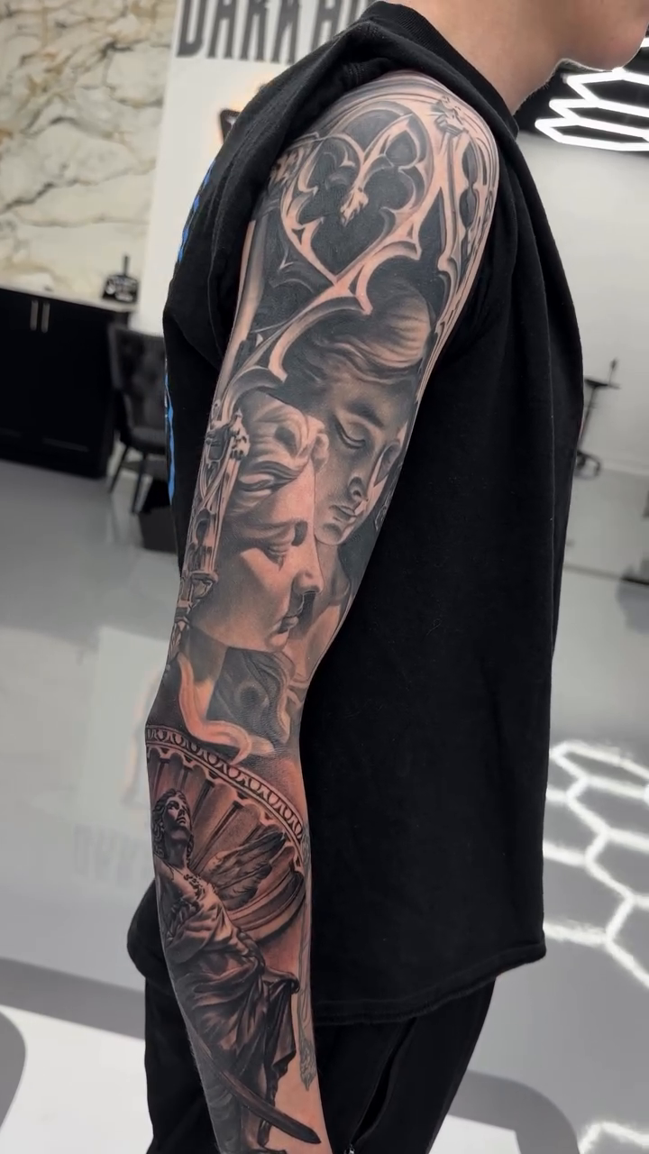 Woman and ornate fan dark realism tattoo by Dakota Case