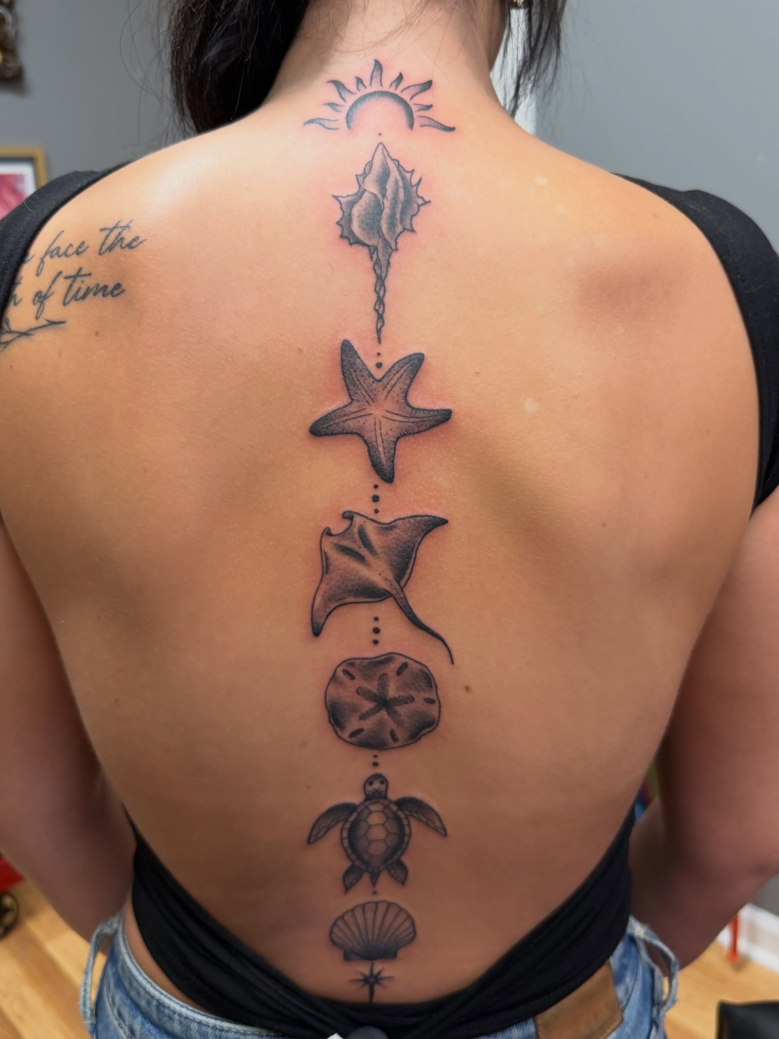 Nautical symbols dotwork tattoo on the back by Mike Lachowicz