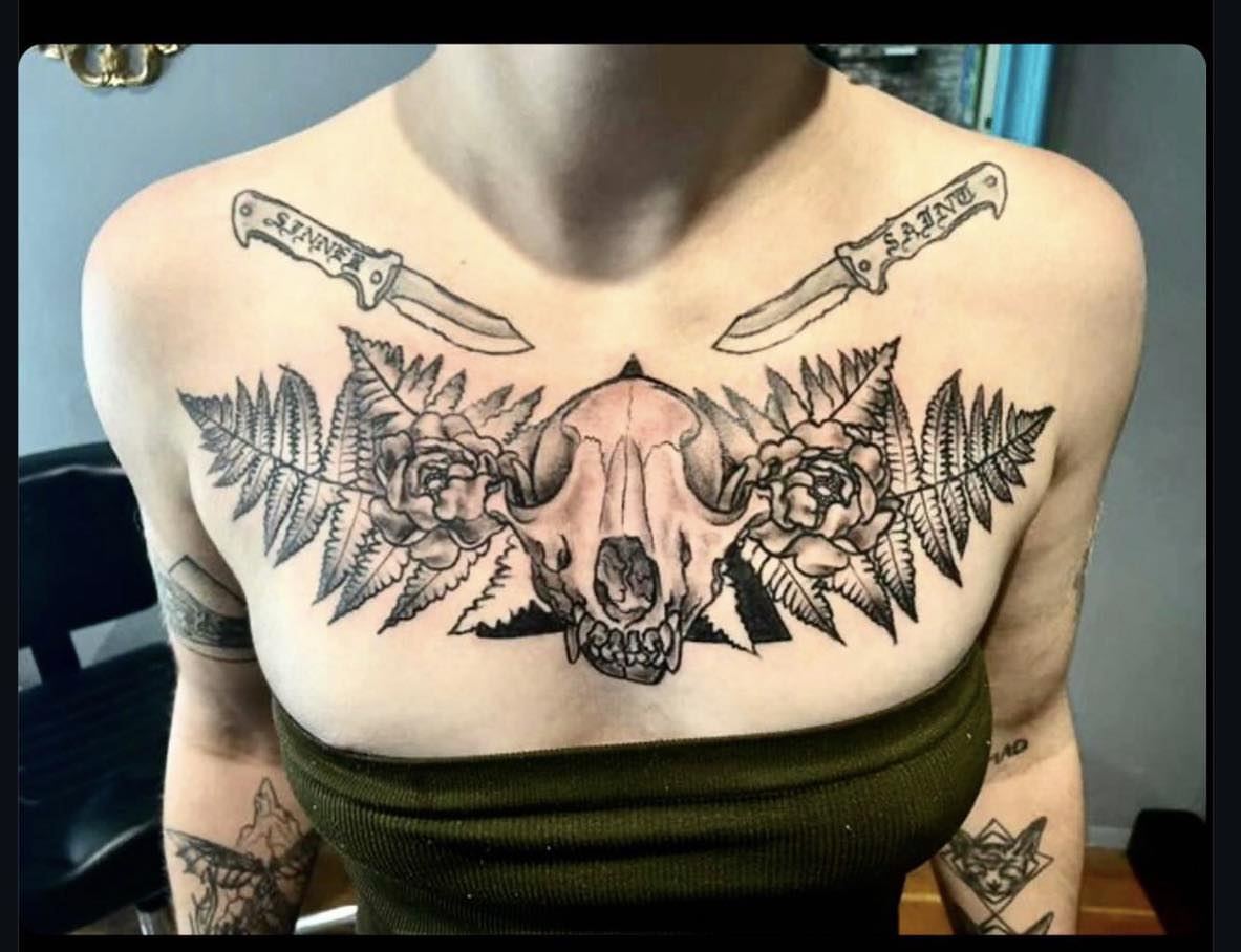 Animal skull with flowers realism tattoo on the chest by Josh O’ + Bird ☘️ 🪶