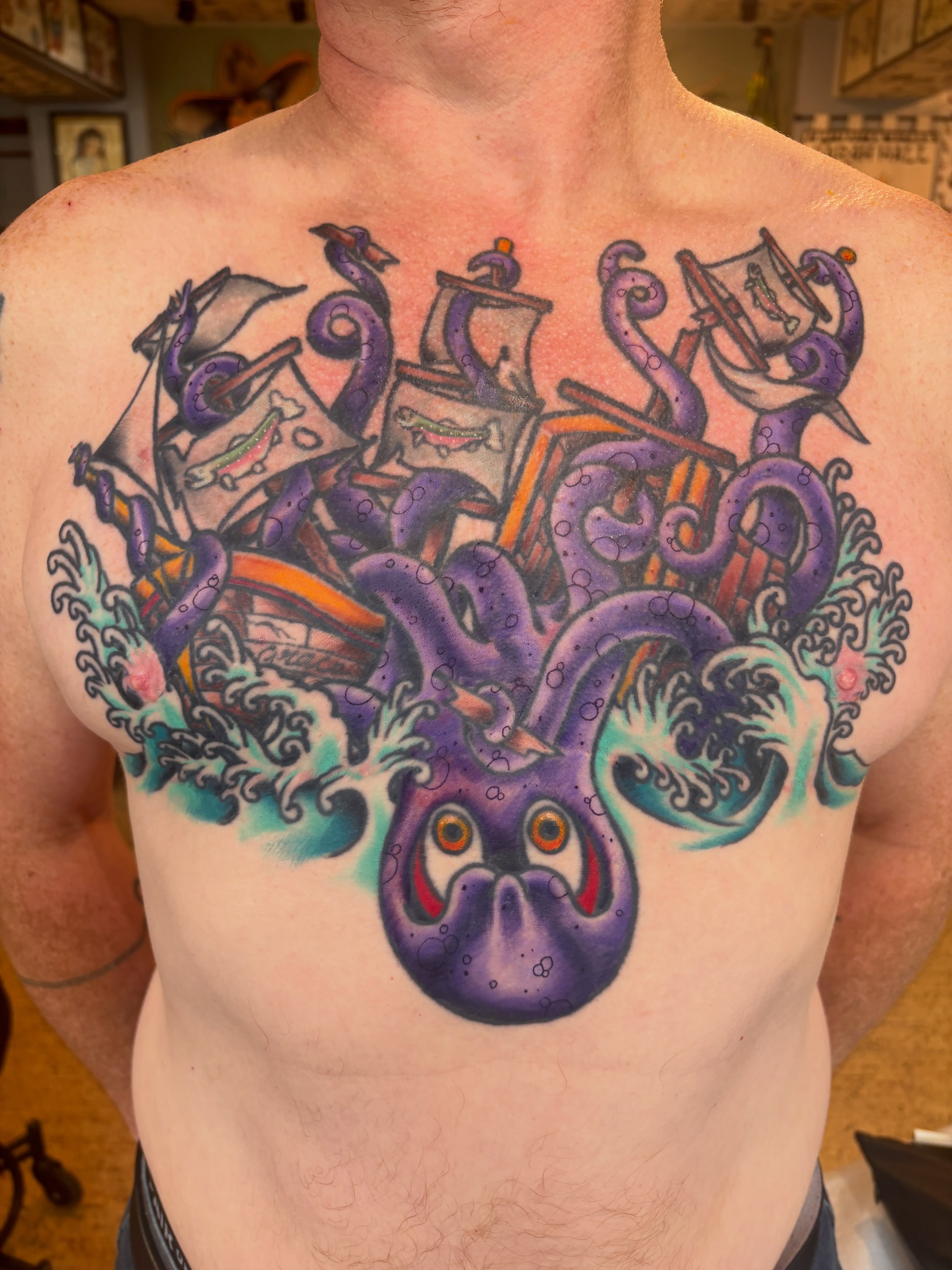 Octopus attacking ships American traditional tattoo on the chest by Kimber Teatro, Portland, Oregon
