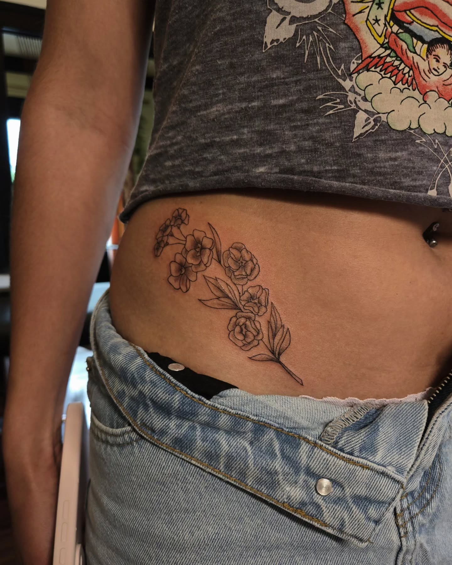 Flowers black and grey tattoo on the ribs by jo(rdan)