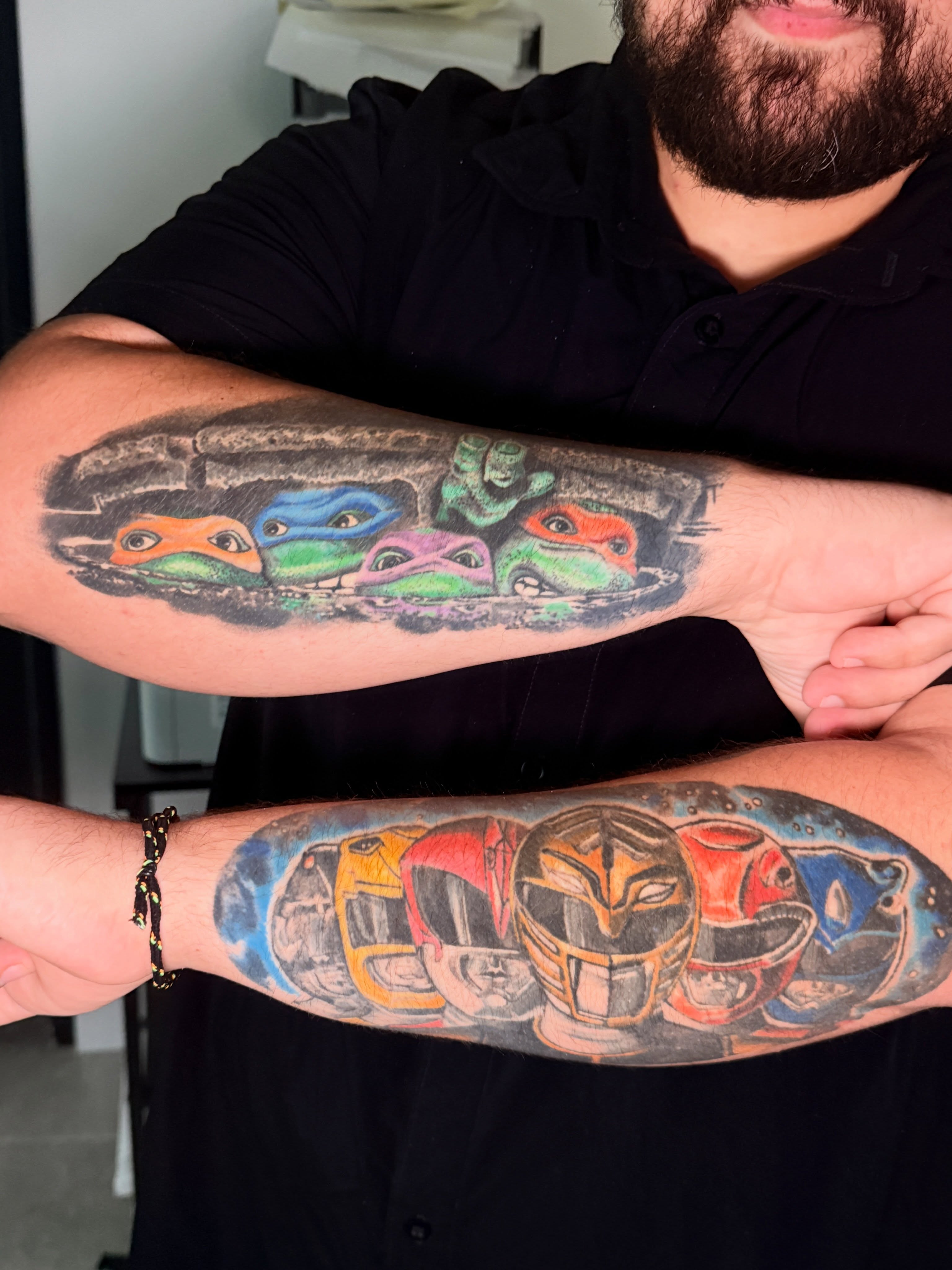 Teenage mutant ninja turtles and power rangers realism tattoo on the forearm by Sean Rakos, Austin, Texas