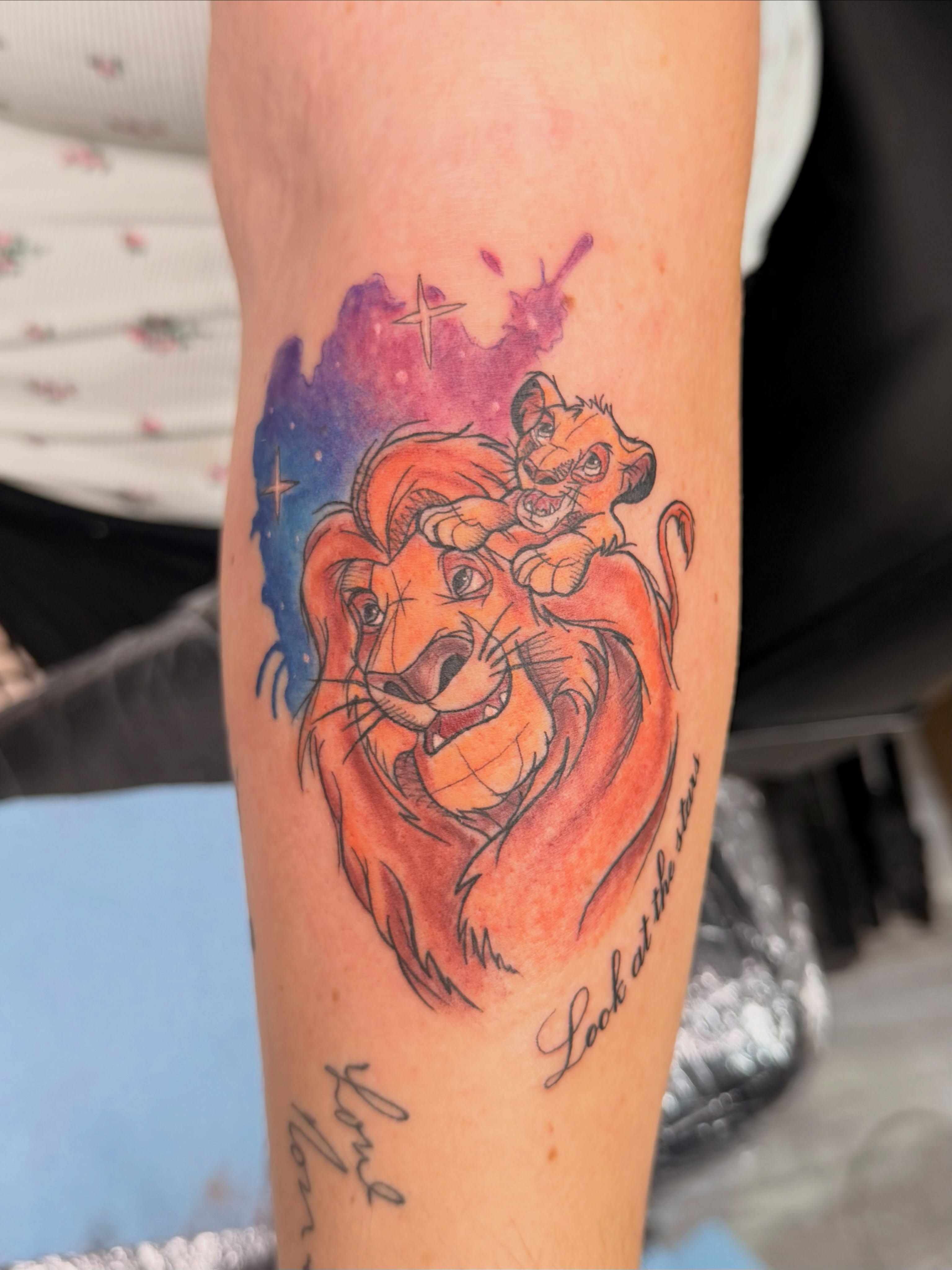 Simba and Nala watercolor tattoo on the forearm by Breanna💉🔮, Dover, Delaware