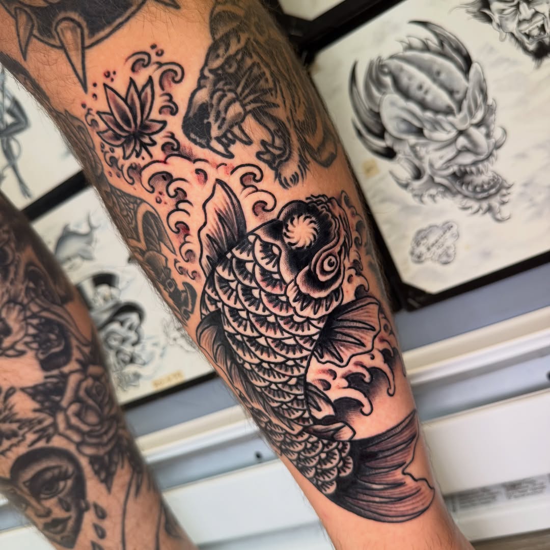 Koi fish japanese irezumi tattoo on the forearm by Mike Dunn