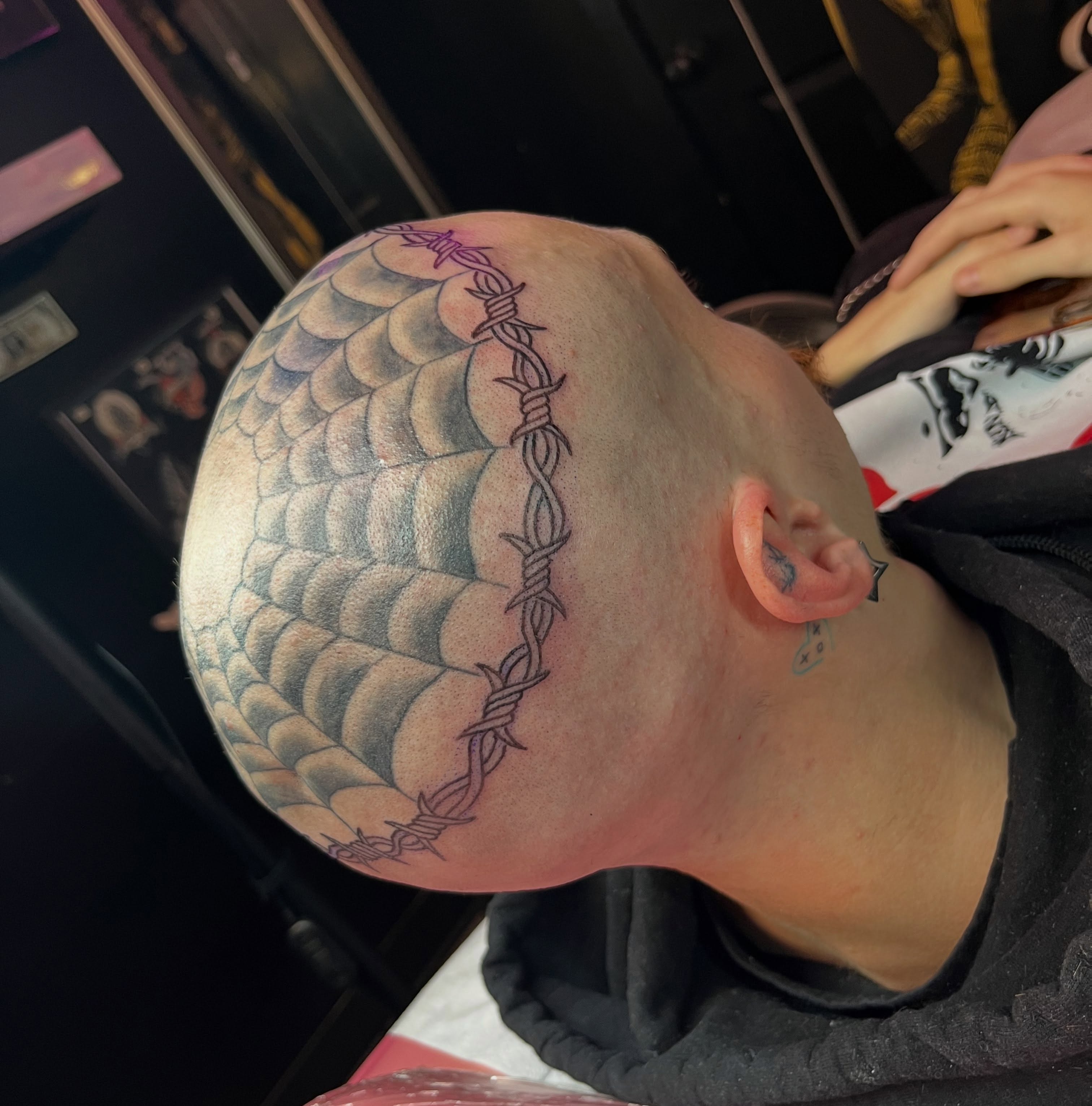 Barbed wire black and grey tattoo on the head by Caitlin, Richmond, Virginia