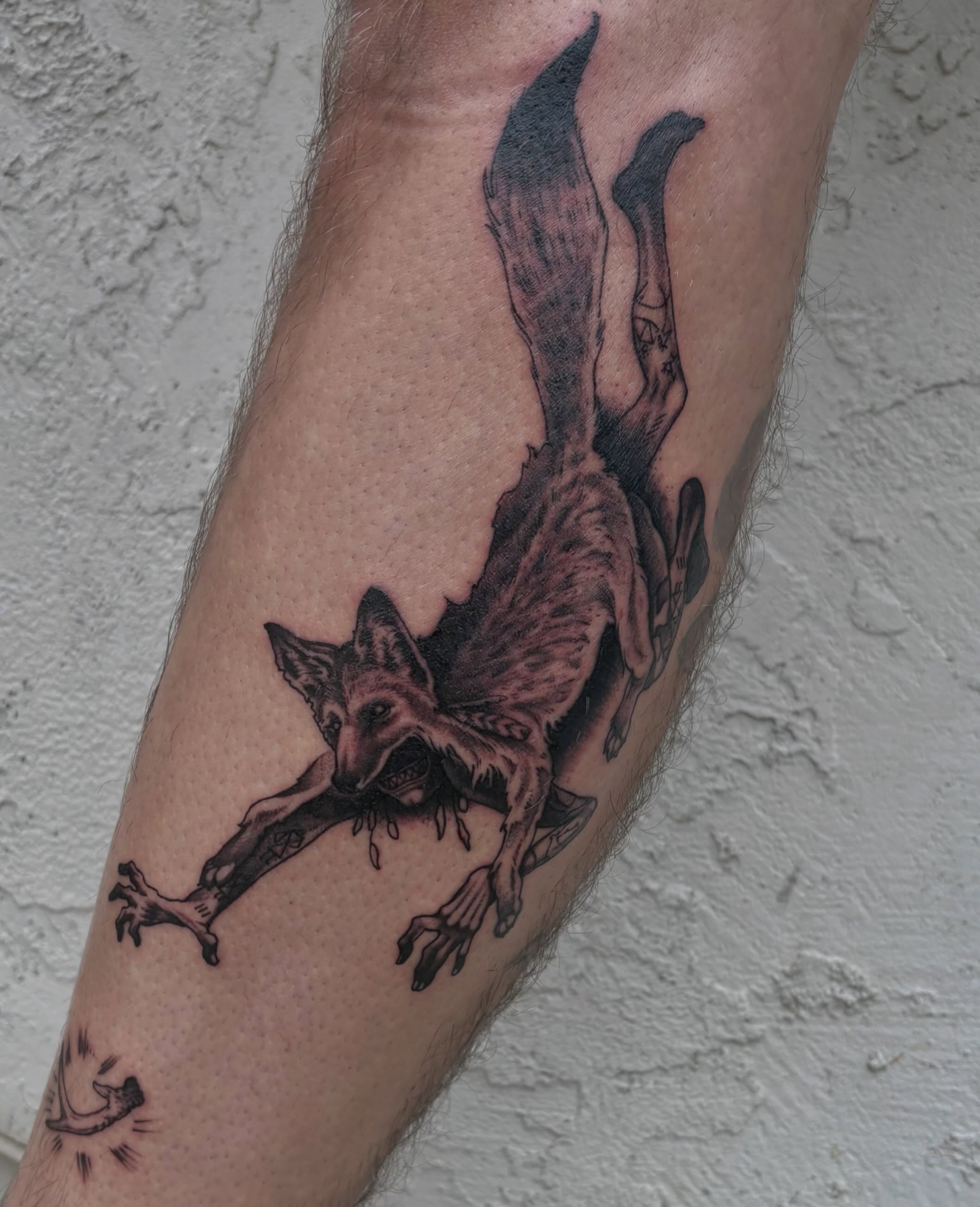 Demon dark realism tattoo on the forearm by Tad Fulkerson, San Francisco, California