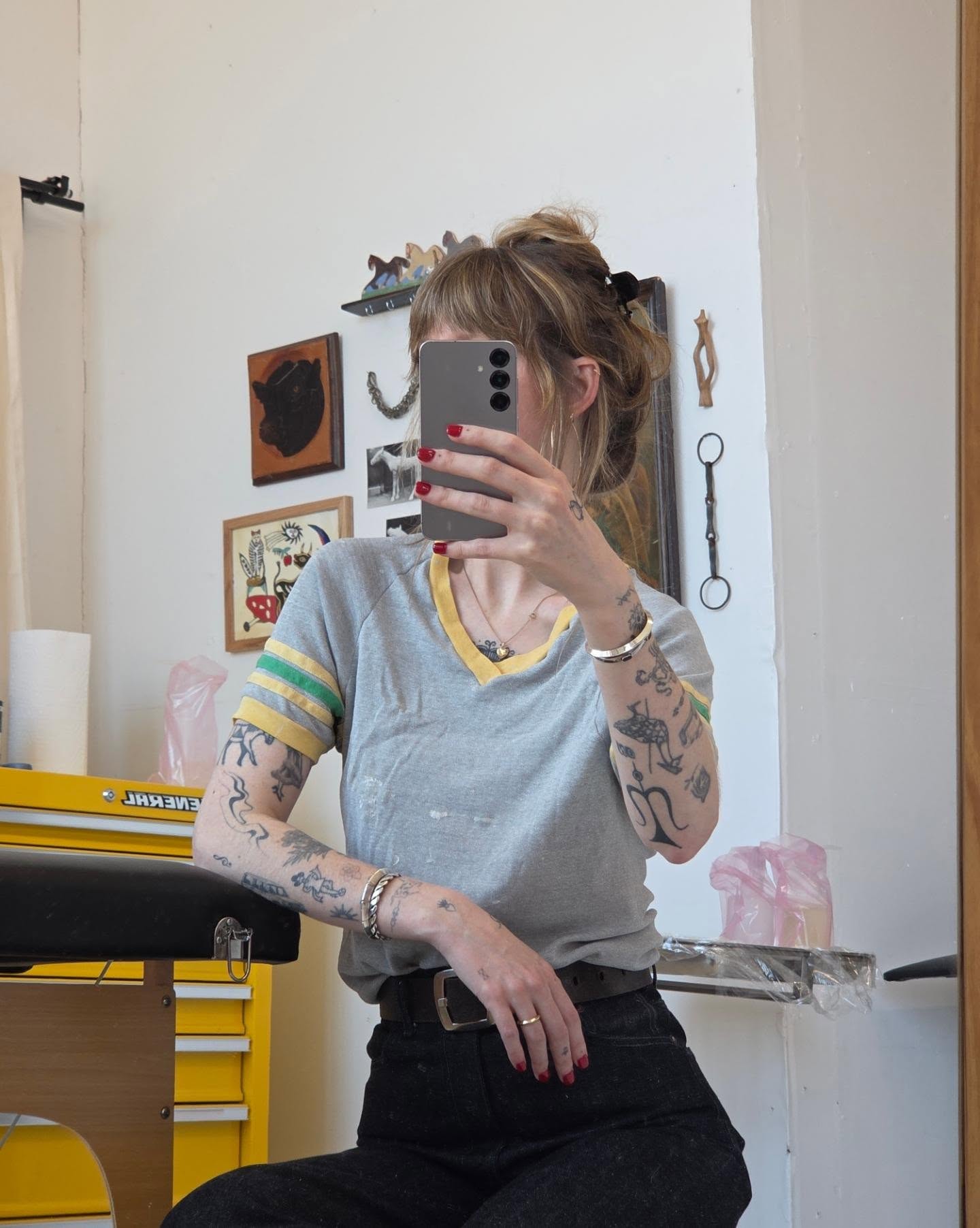 Tattooed arms American traditional tattoo on the upper arm by jules tattoos