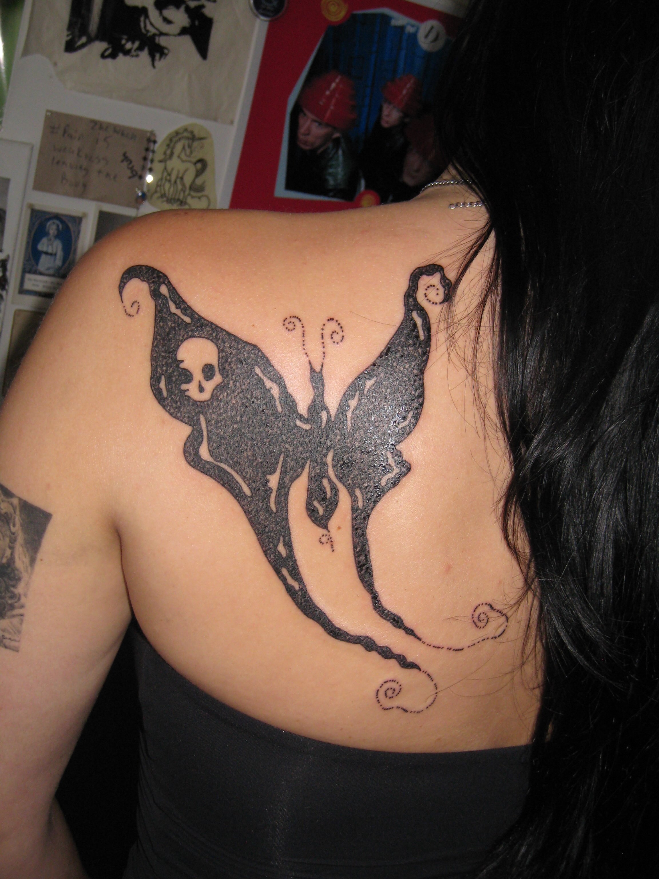 Butterfly dotwork tattoo on the back by jonatan