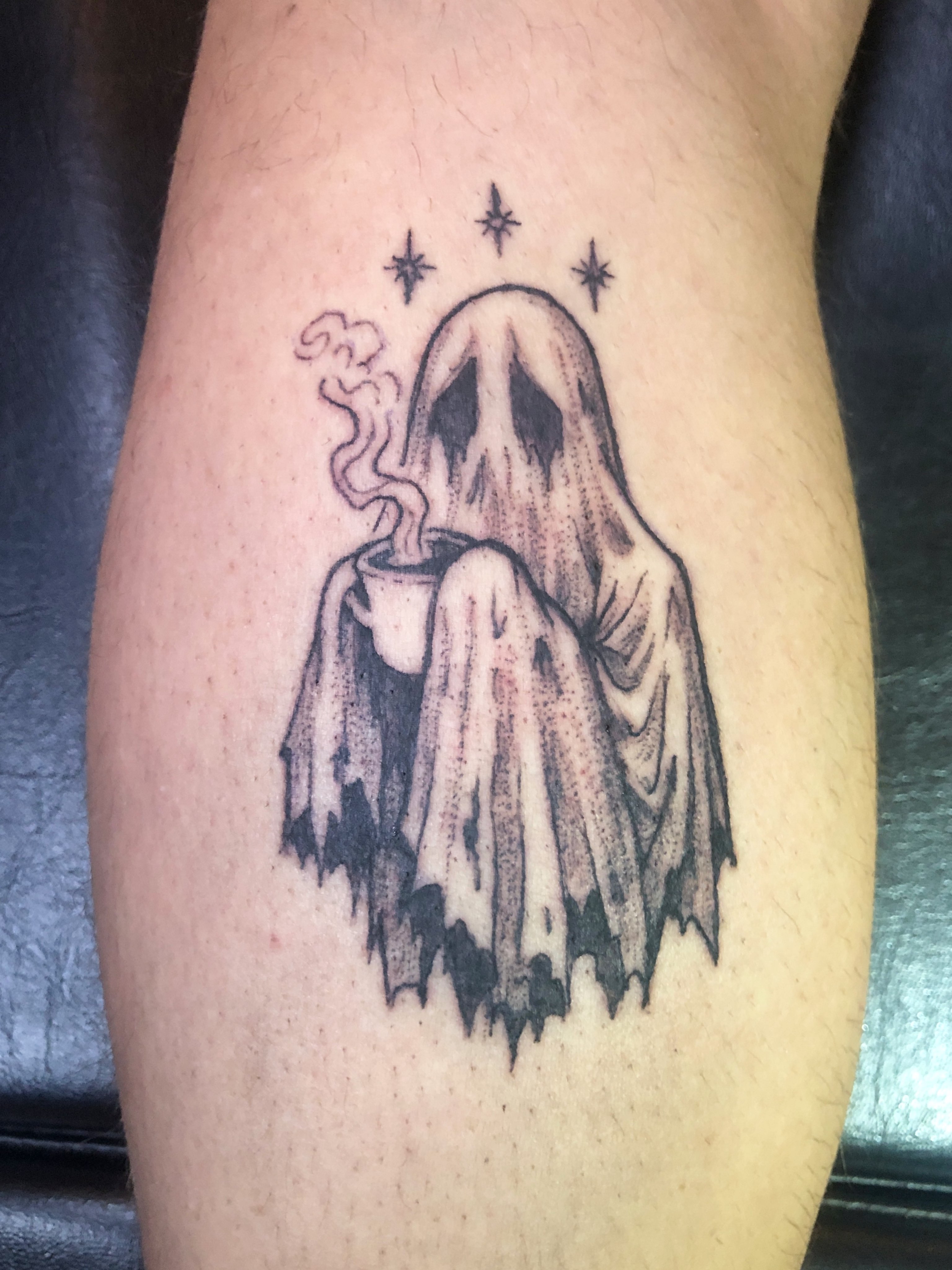 Ghost with coffee mug black and grey tattoo on the forearm by Dharm, Denver, Colorado