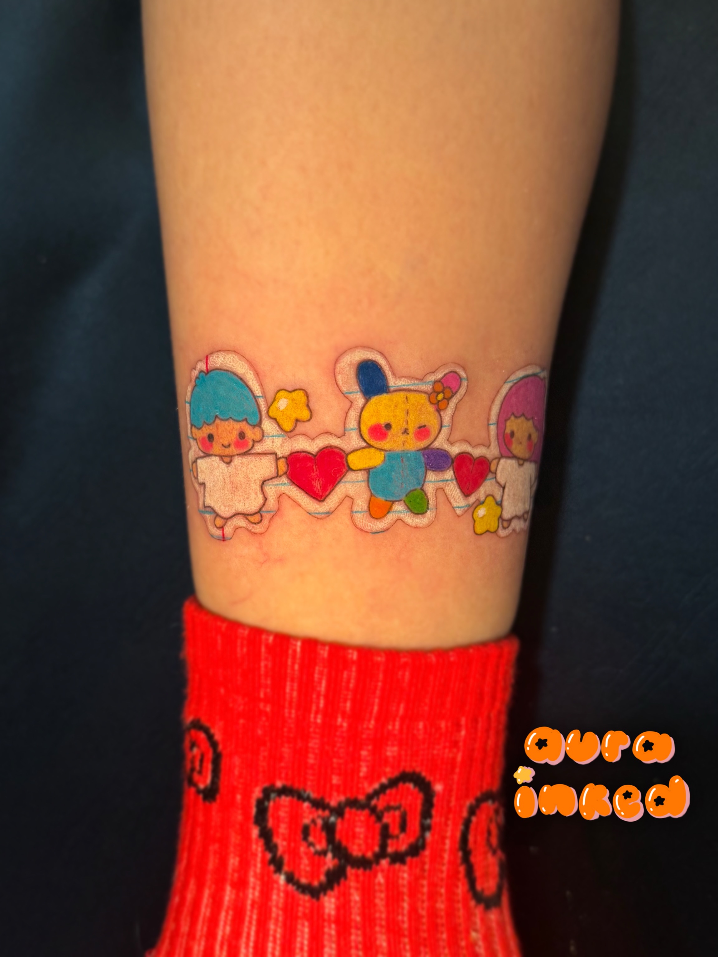 Kawaii characters illustrative tattoo on the forearm by Delly ⌯
