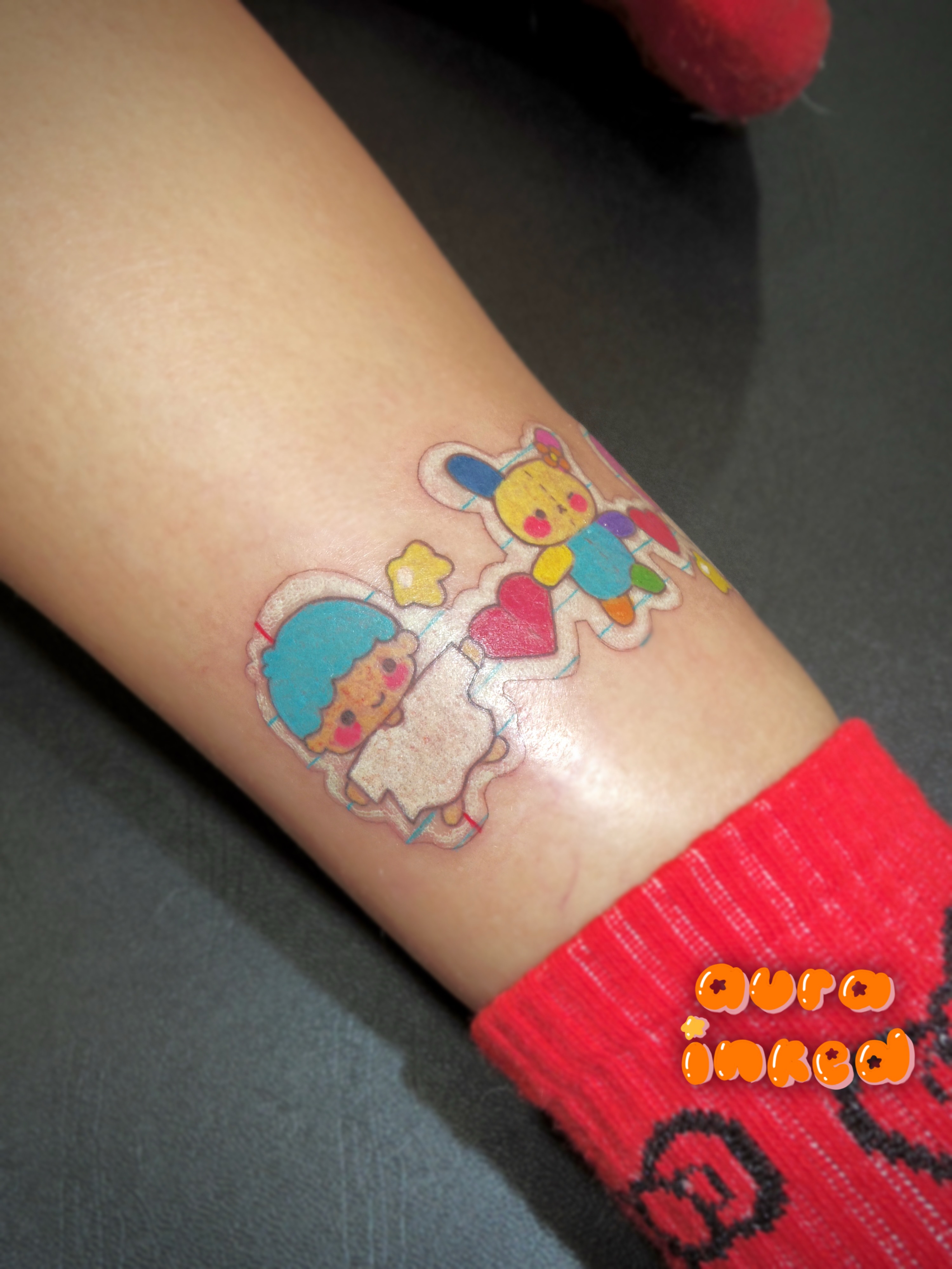 Anime characters illustrative tattoo on the forearm by Delly ⌯