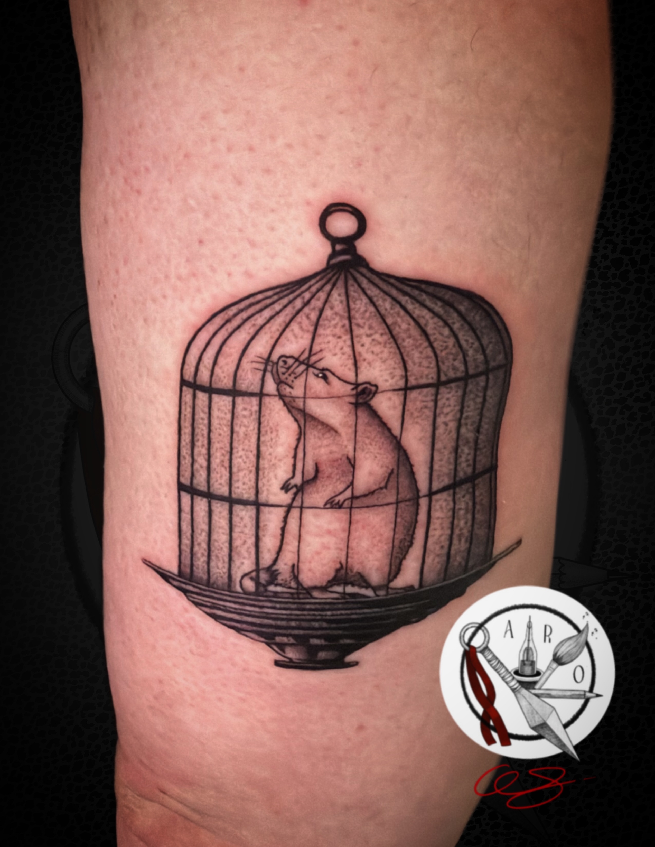 Rat in cage dotwork tattoo on the forearm by Aaron Strobehn