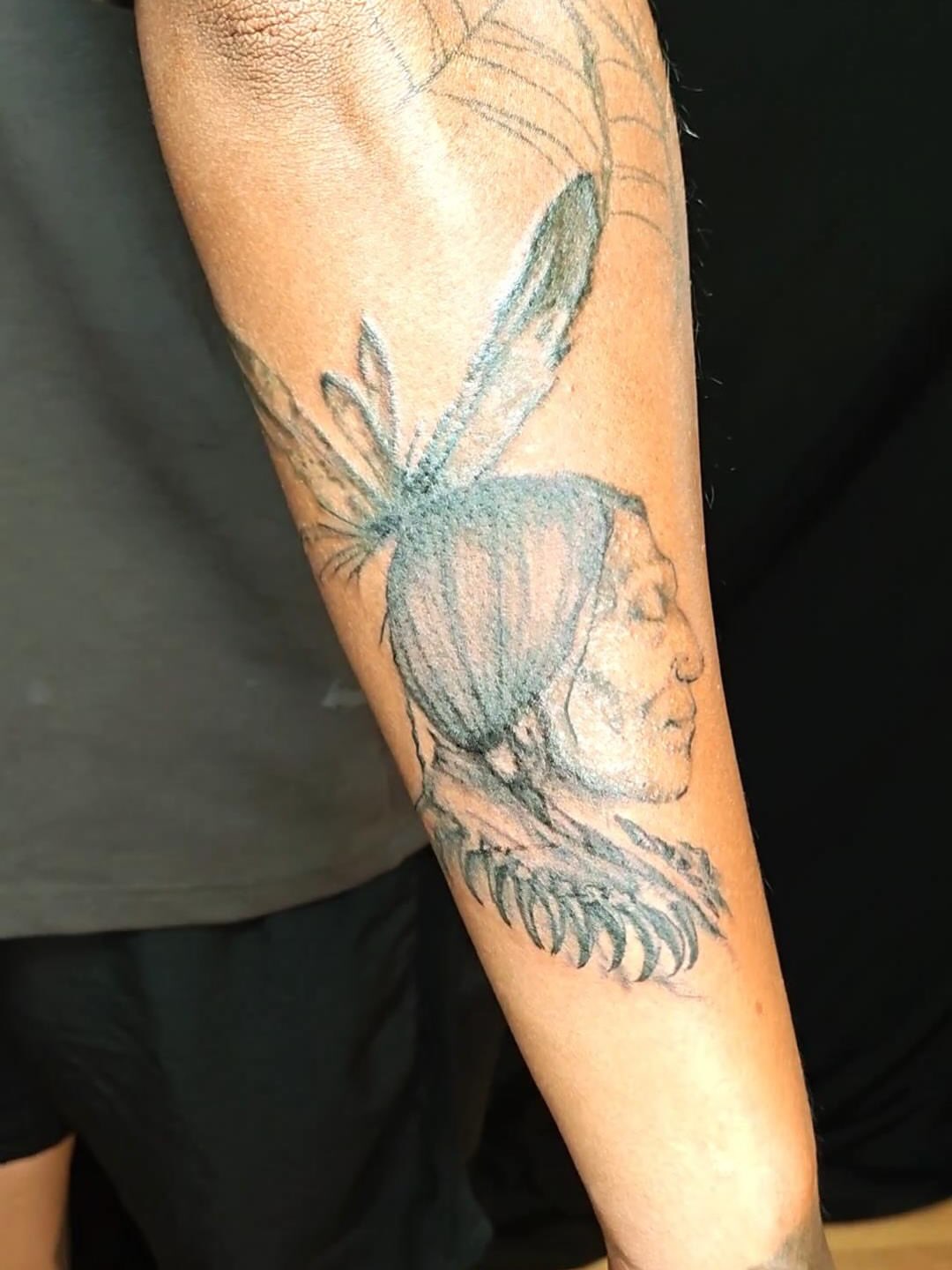 Bee and woman realism tattoo on the forearm by Sebastiana