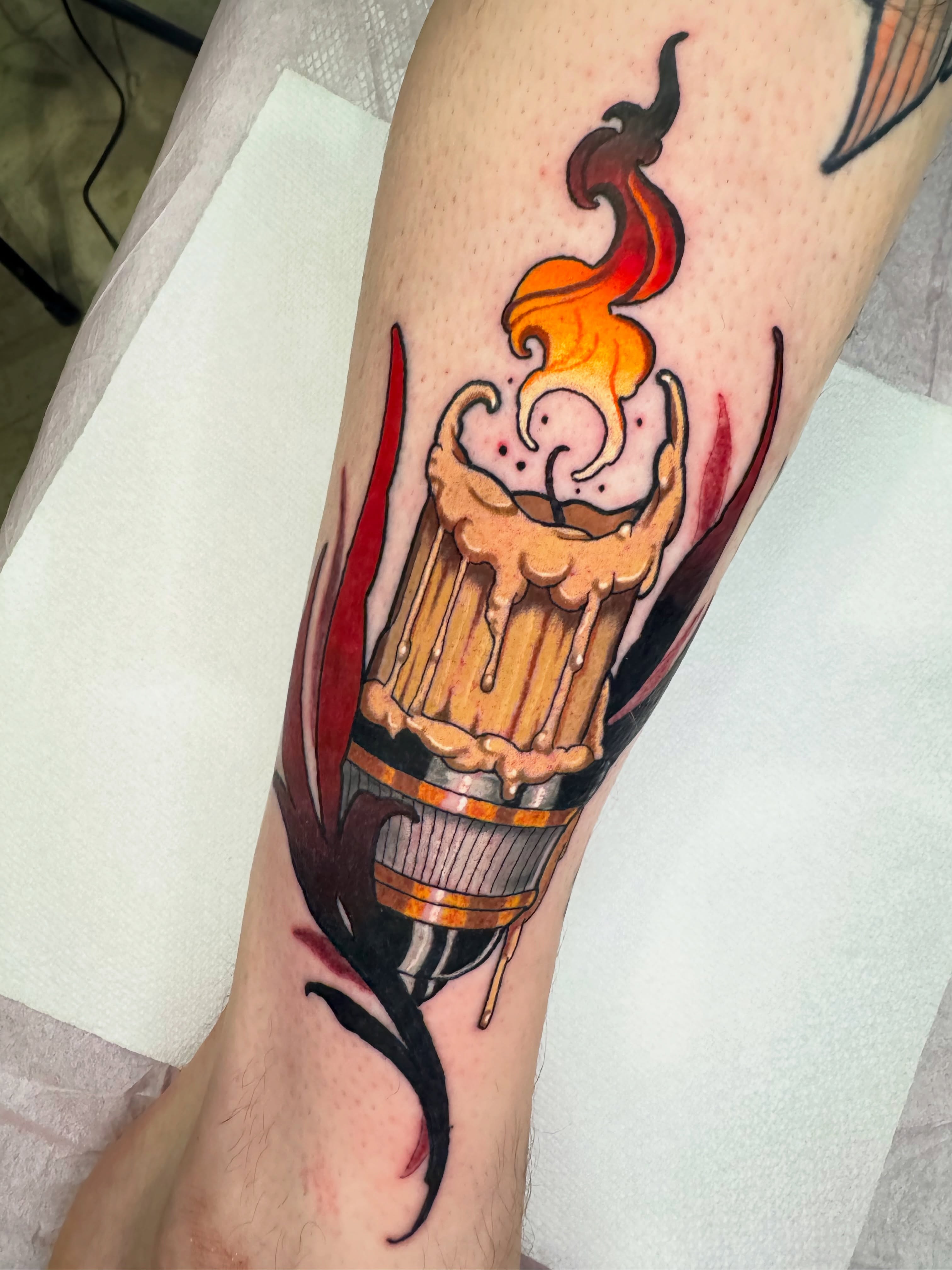 Beer mug with flames American traditional tattoo on the forearm by Luis Torres, Harrison, New Jersey