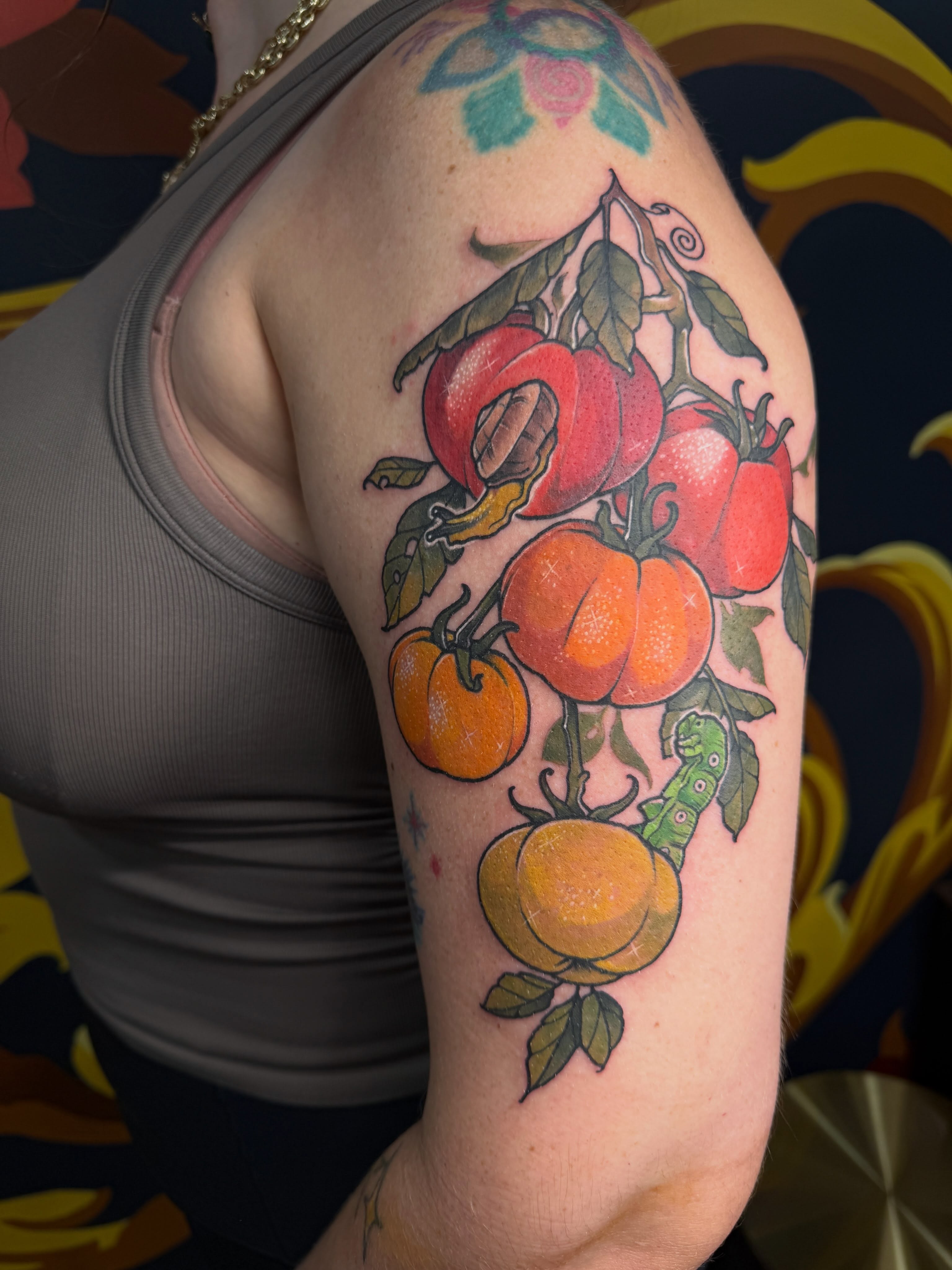 Tomatoes and caterpillar realism tattoo on the upper arm by 🦋ｊｅｓｓｉｃａ  f  o  x🦋, Nashville, Tennessee