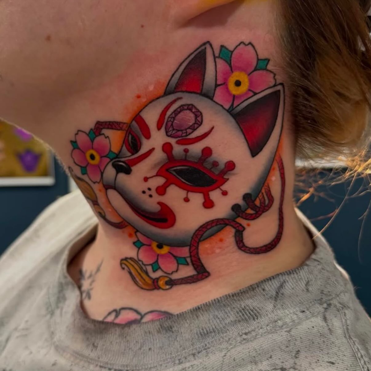 Chihuahua American traditional tattoo on the neck by Matthew Gordon