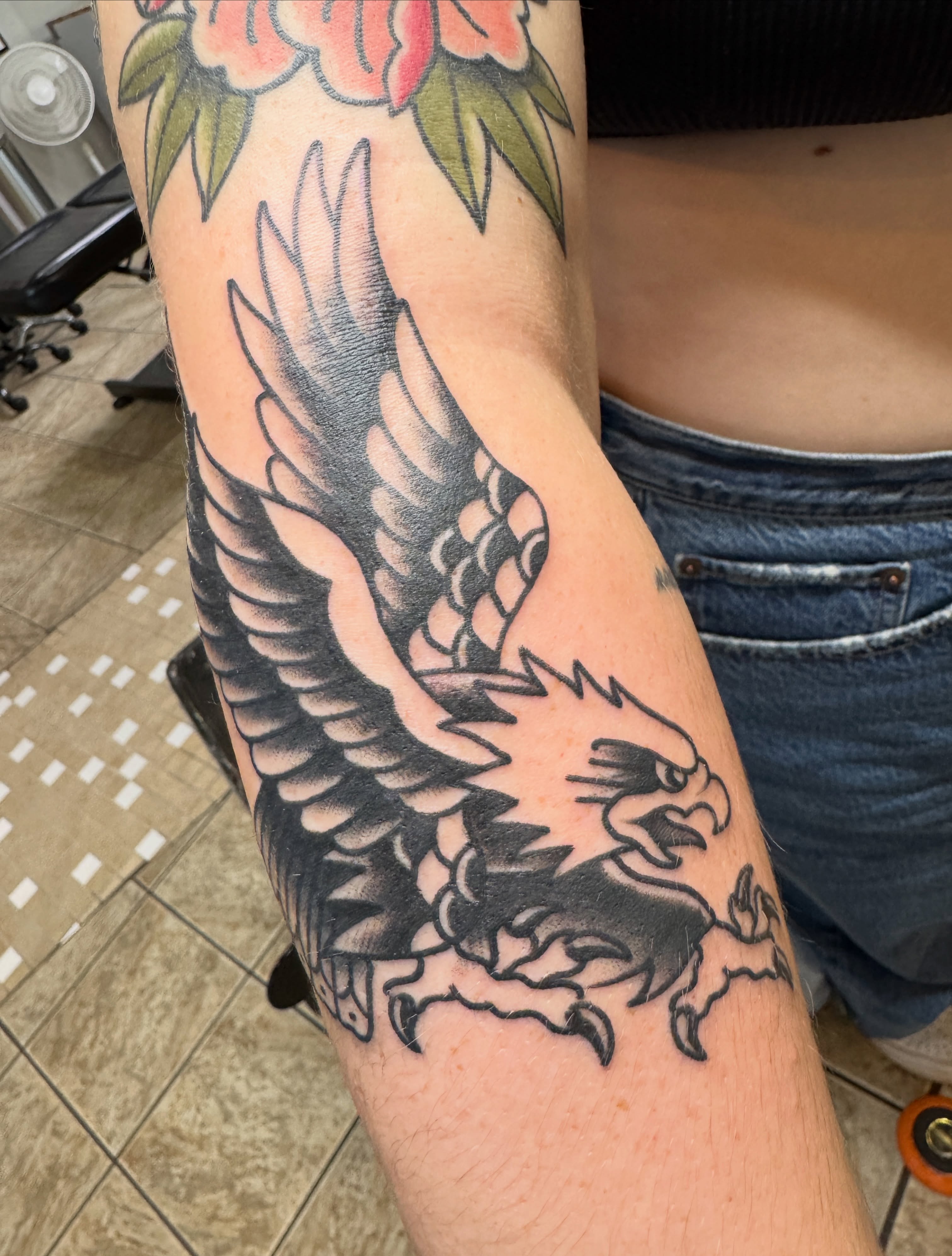 Eagle American traditional tattoo on the forearm by Cary Aldridge