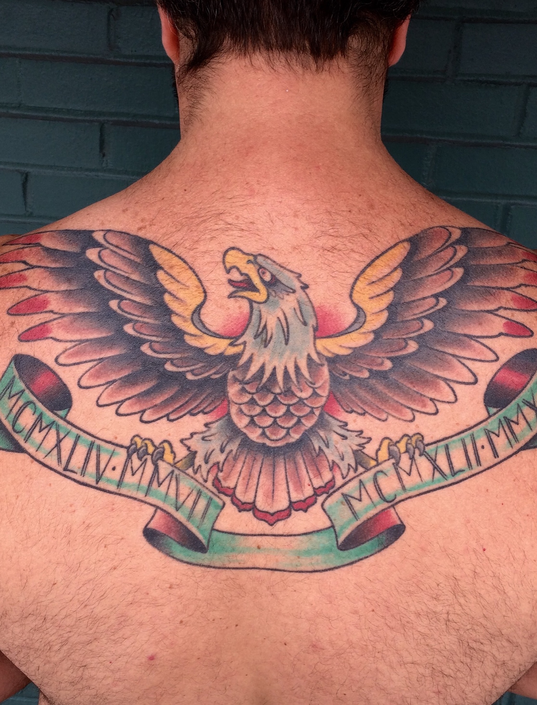 Eagle American traditional tattoo on the back by Cary Aldridge