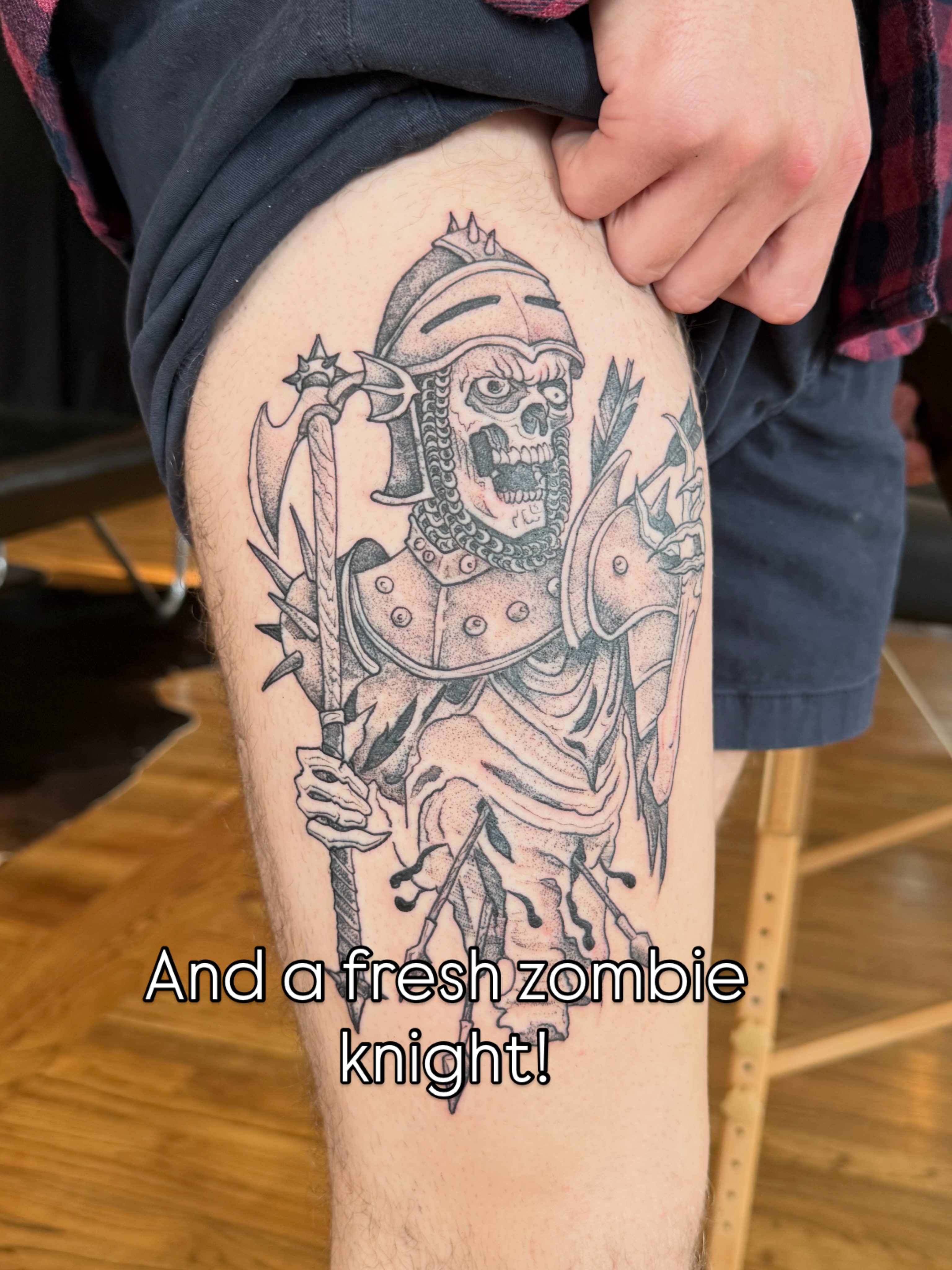 Zombie knight black and grey tattoo on the thigh by Benjamin Carlson