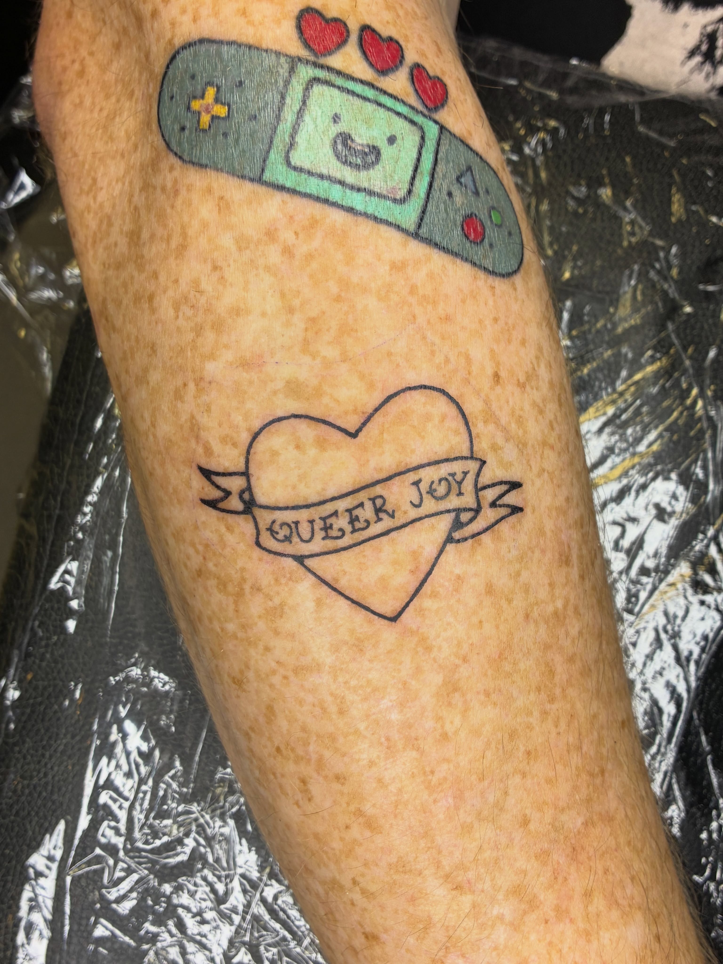 Video game controller dotwork tattoo on the forearm by Lance 🦈