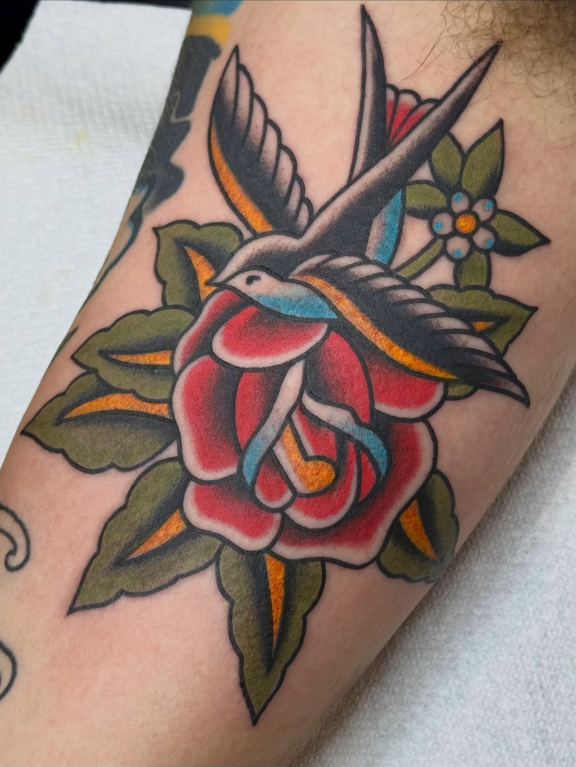 Rose and swallow American traditional tattoo on the forearm by Kiera ❤️‍🔥