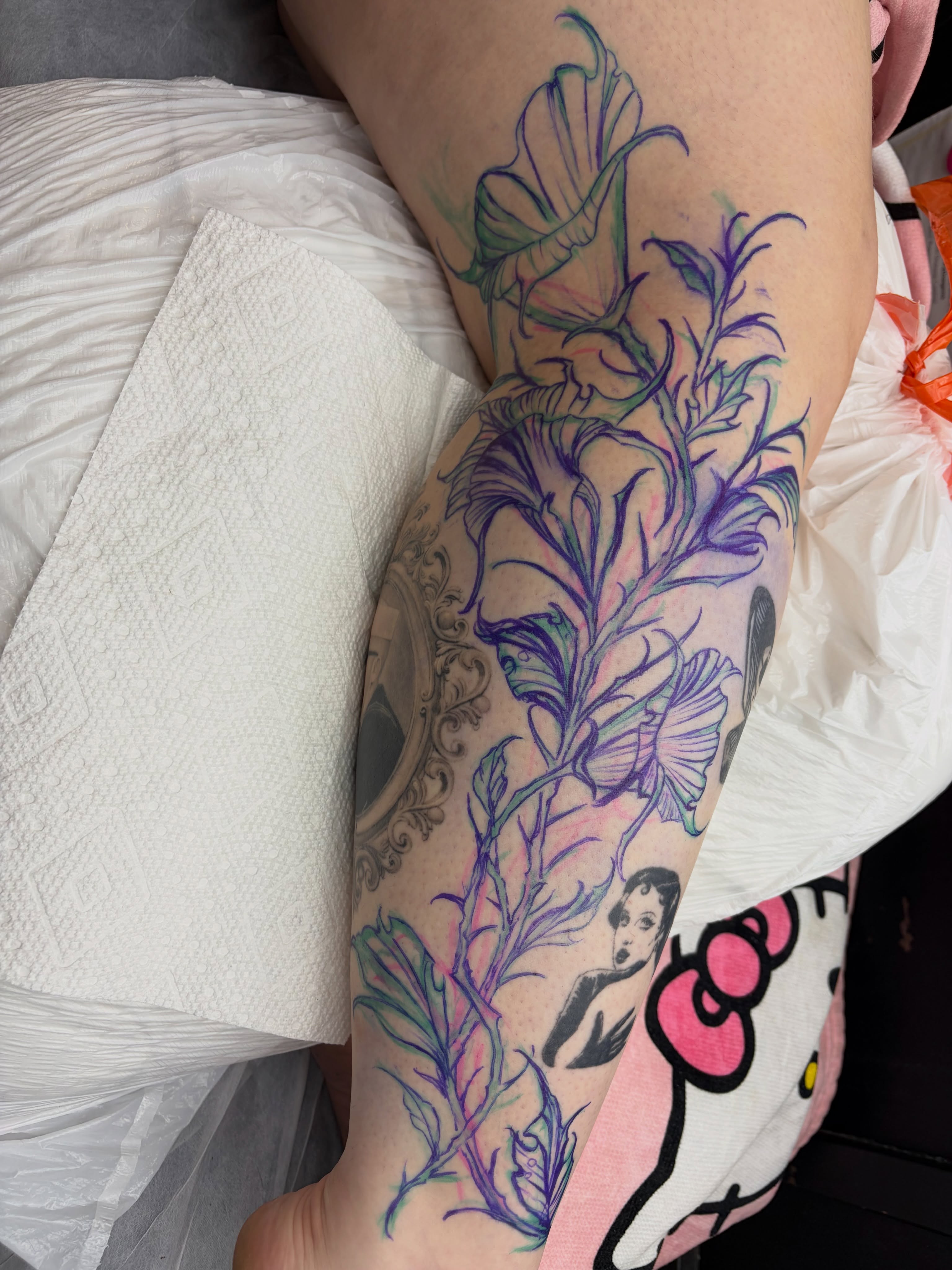 Floral arrangement new school tattoo on the forearm by Haley