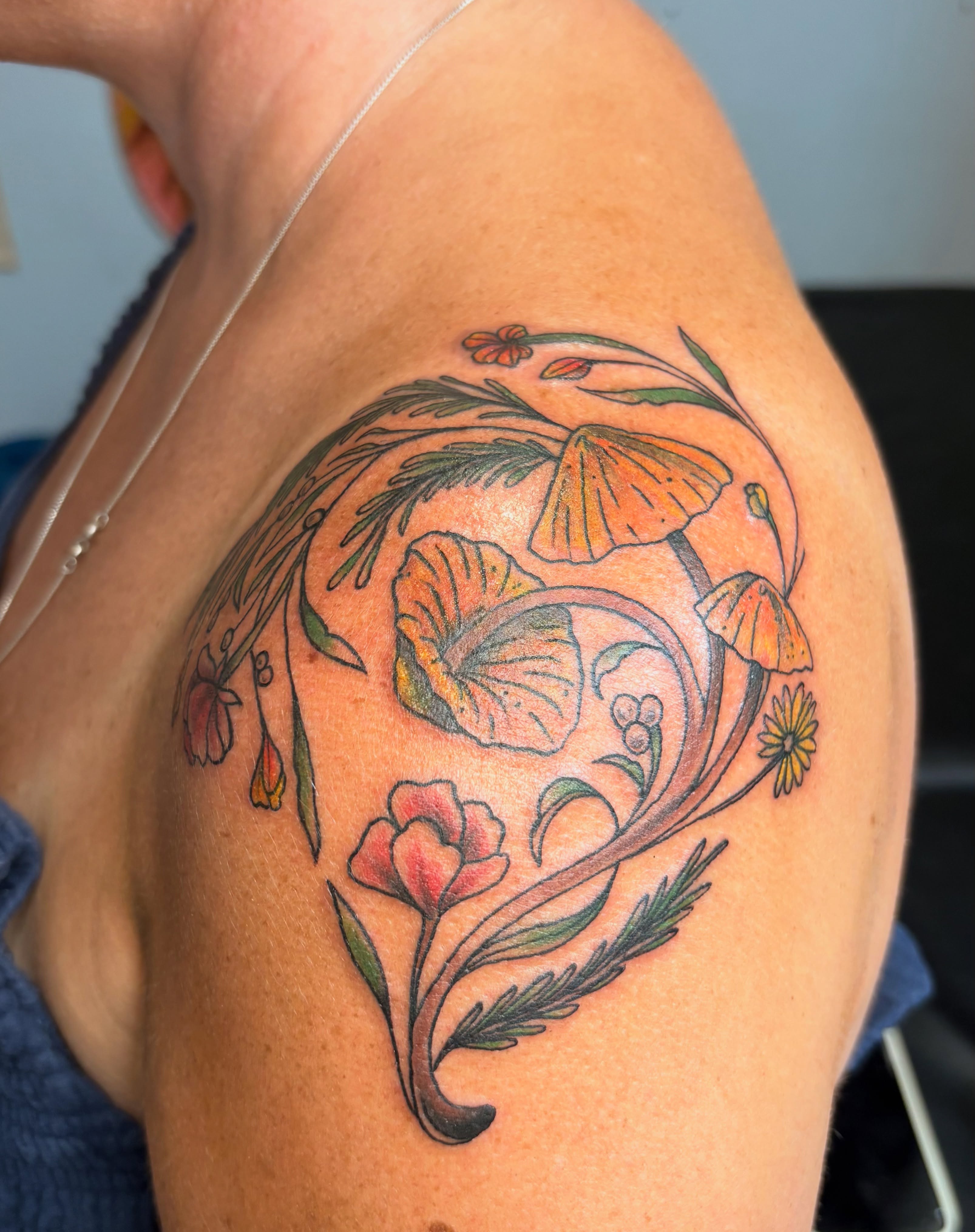 Mushroom and floral arrangement new school tattoo on the shoulder by Casey - Tattooer, Salem, Massachusetts