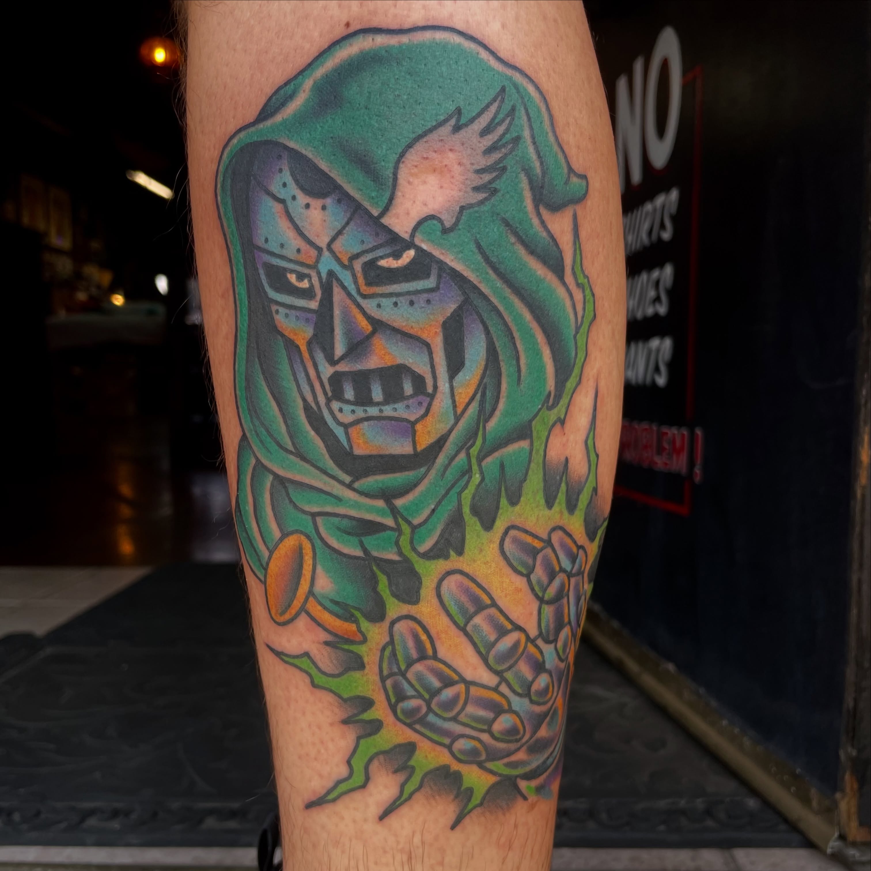 Skull and hooded figure American traditional tattoo on the forearm by Tom Taylor, Philadelphia, Pennsylvania