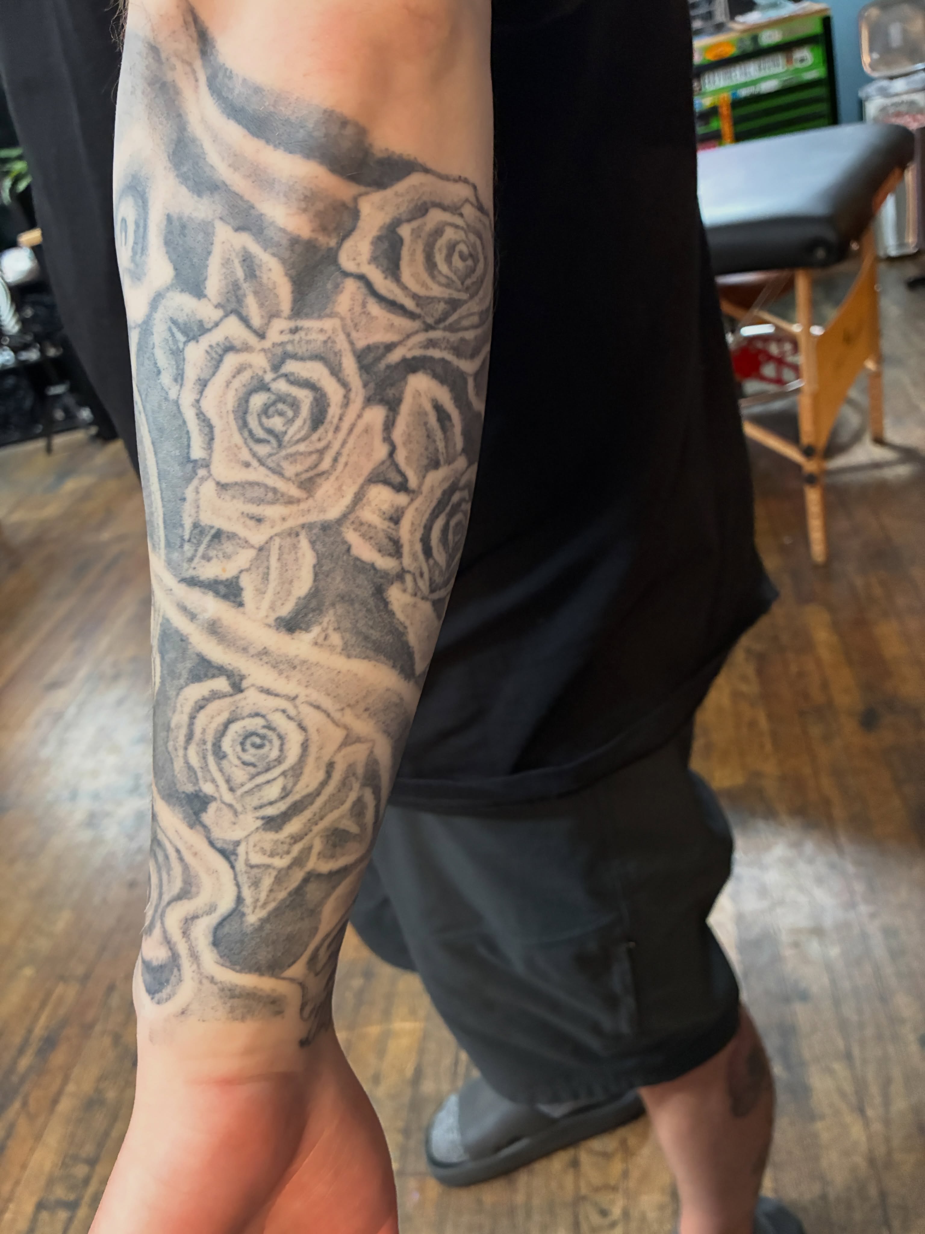 Roses black and grey tattoo on the forearm by Seattle Tattoo Artist