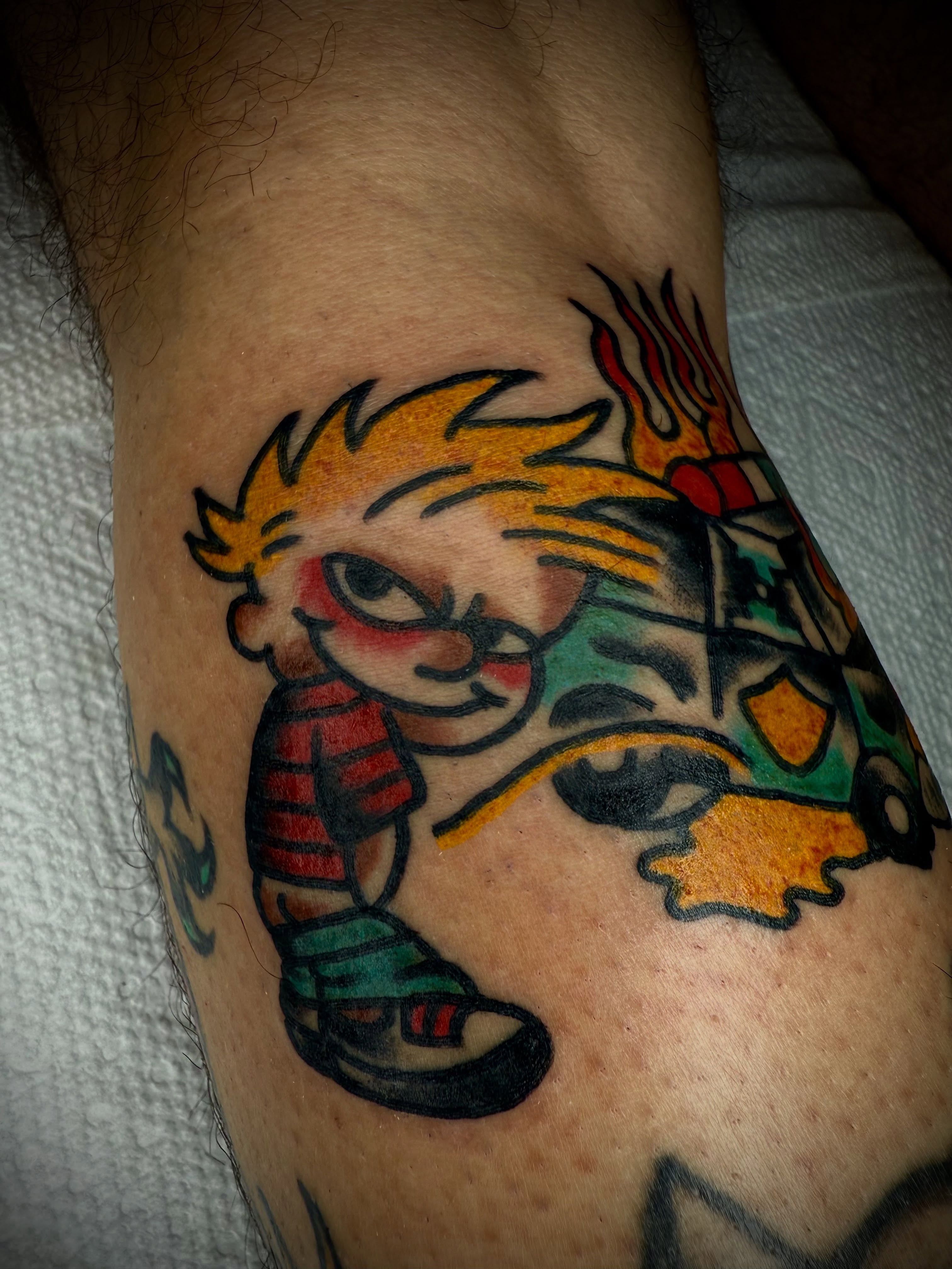 Chucky American traditional tattoo on the forearm by Victoria Lagano NYC Traditional Tattoos