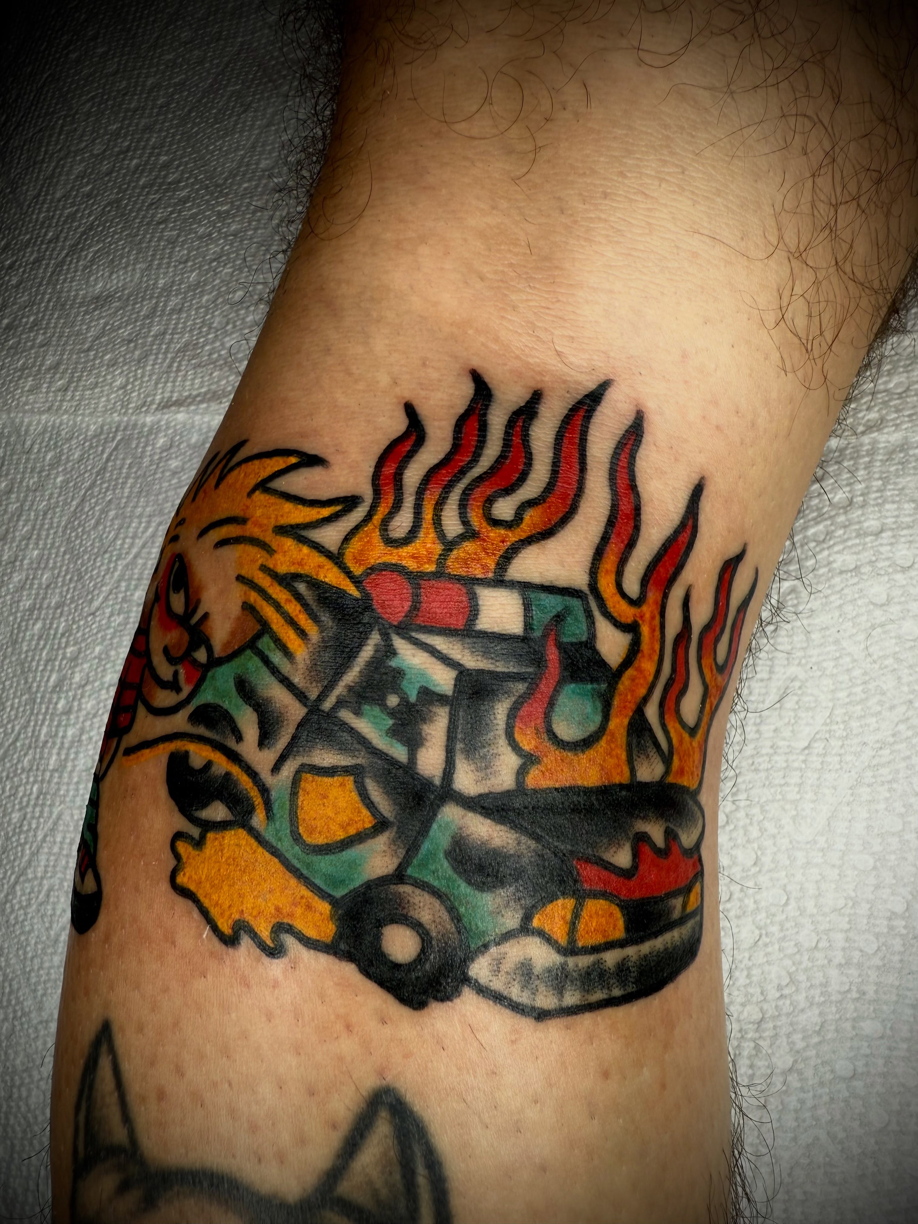 Race car American traditional tattoo on the forearm by Victoria Lagano NYC Traditional Tattoos