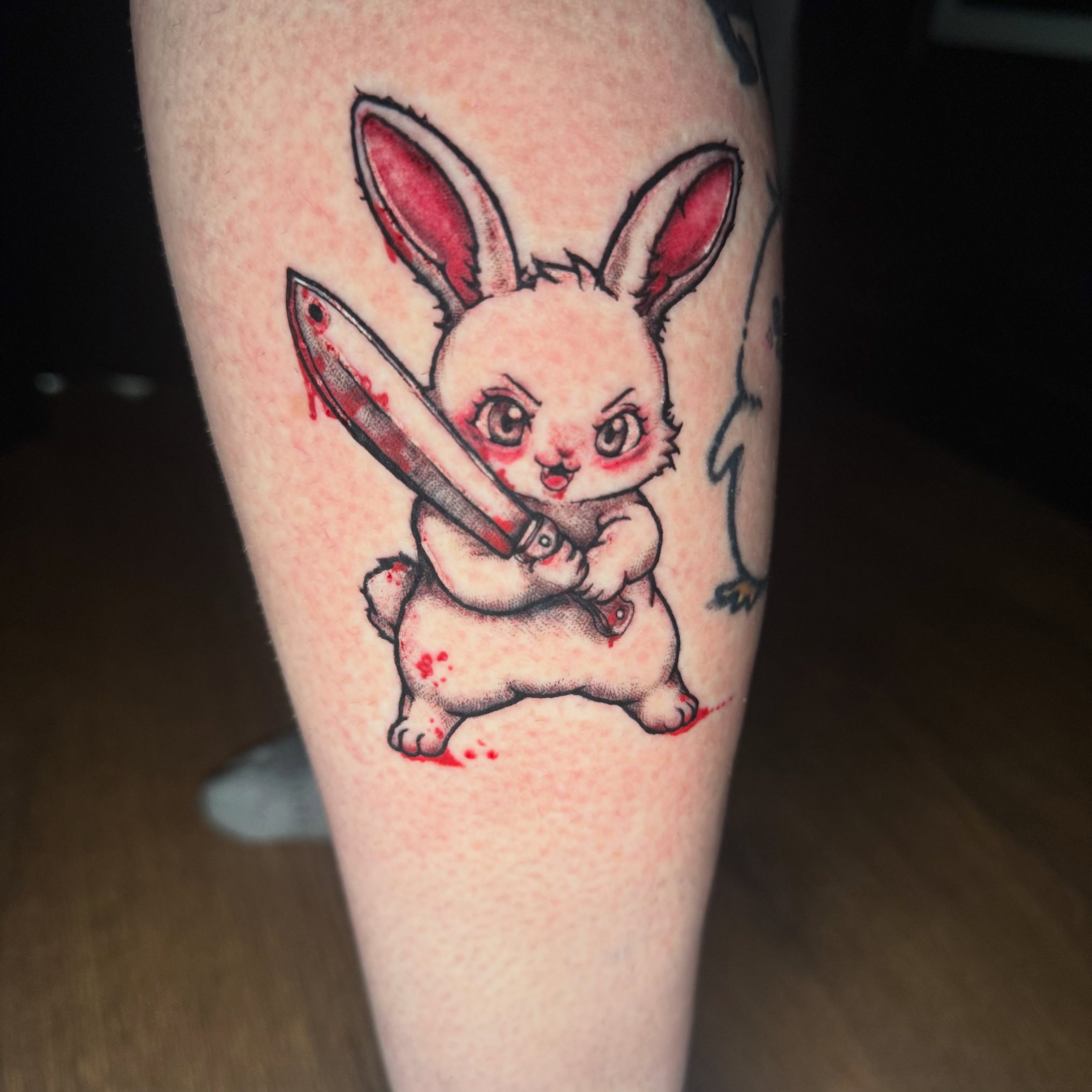 Angry bunny with knife dotwork tattoo on the forearm by Chuckthegirl