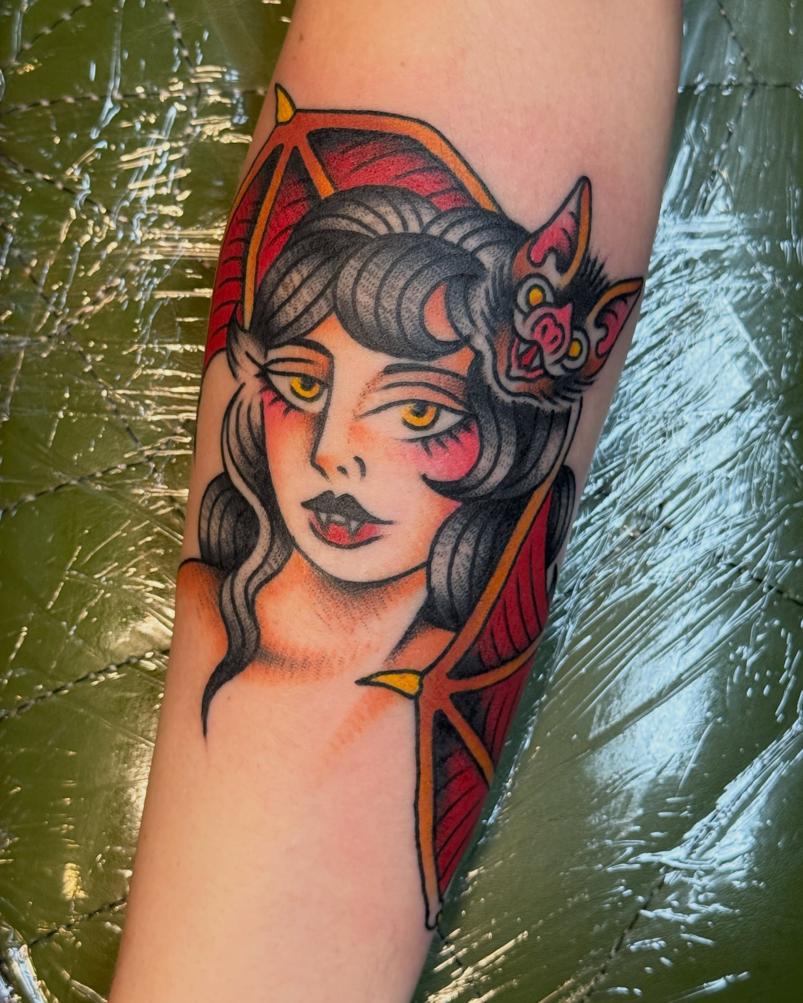 Woman with horns American traditional tattoo on the forearm by Traddy Maddie ๐