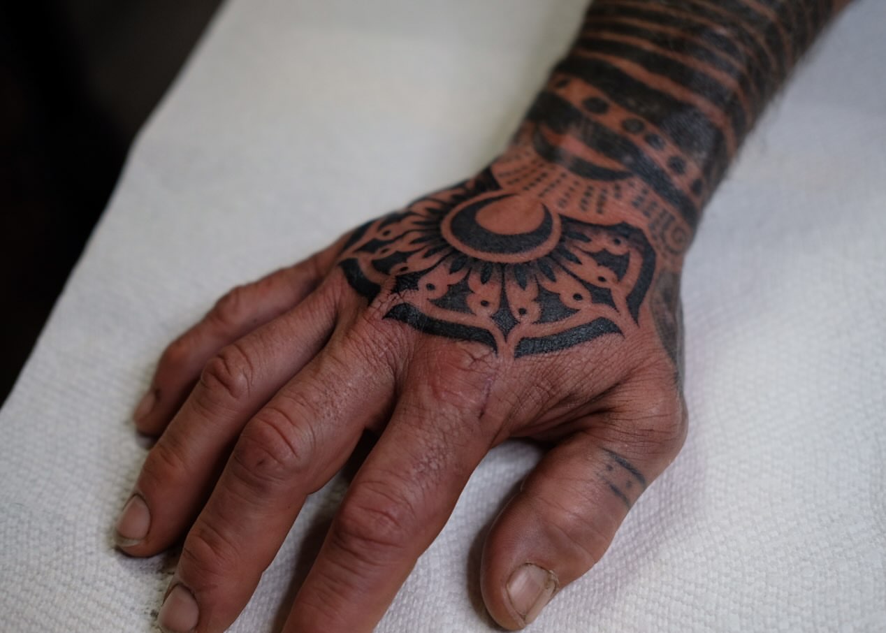 Tribal tribal tattoo on the hand by Owlyn Madrone
