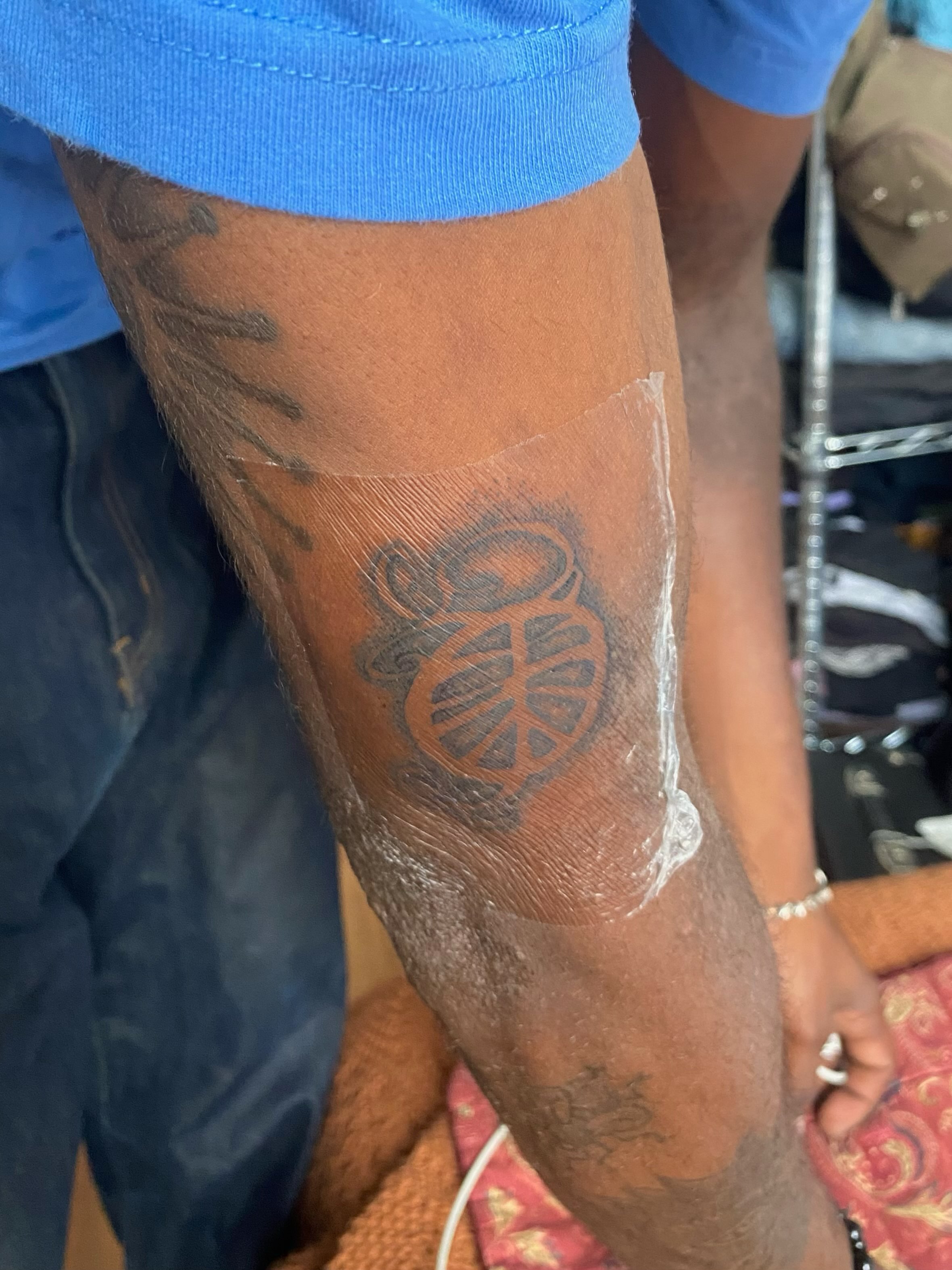 Circle with cross black and grey tattoo on the forearm by @feverfeverish