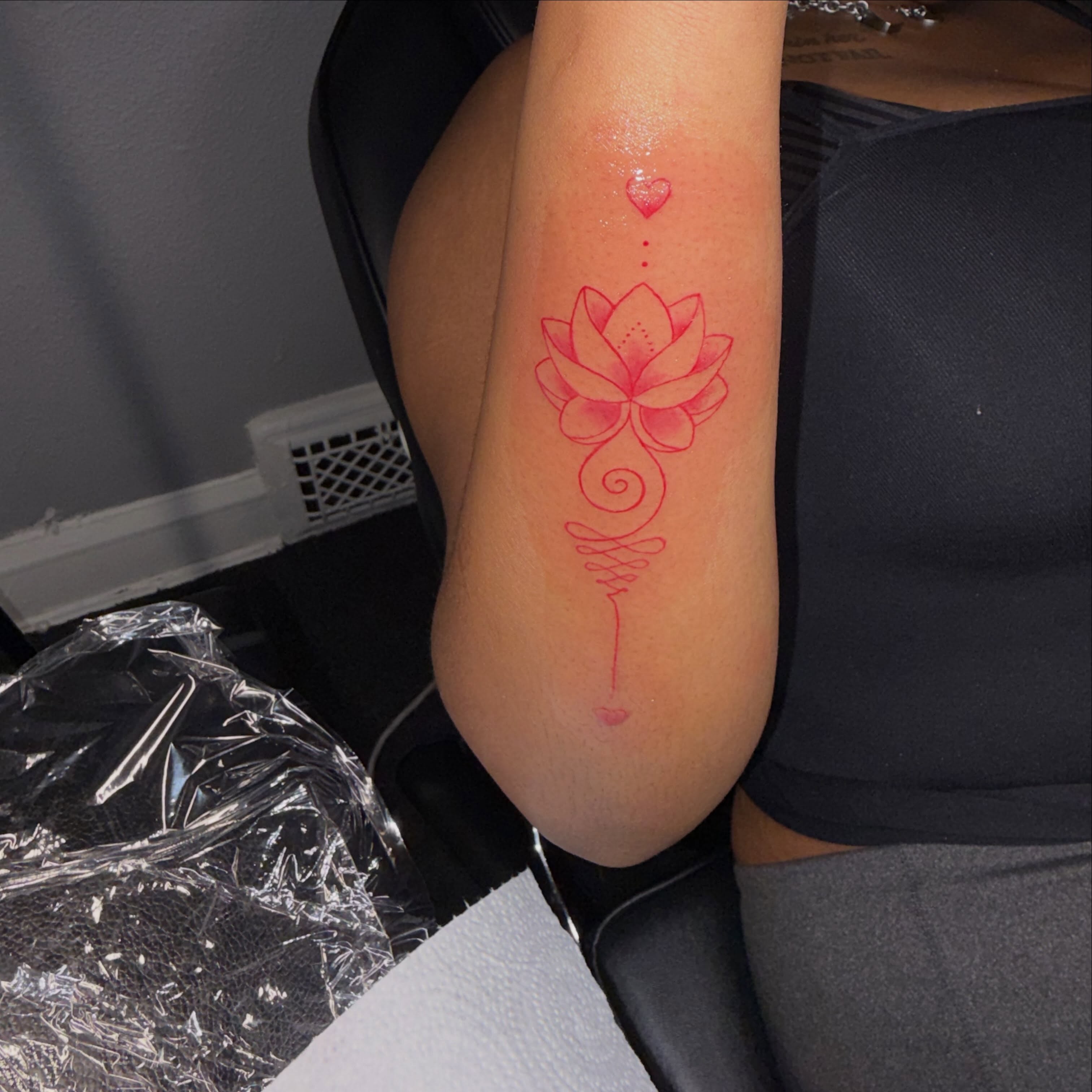 Lotus flower dotwork tattoo on the forearm by 216 Tattoos 🥰