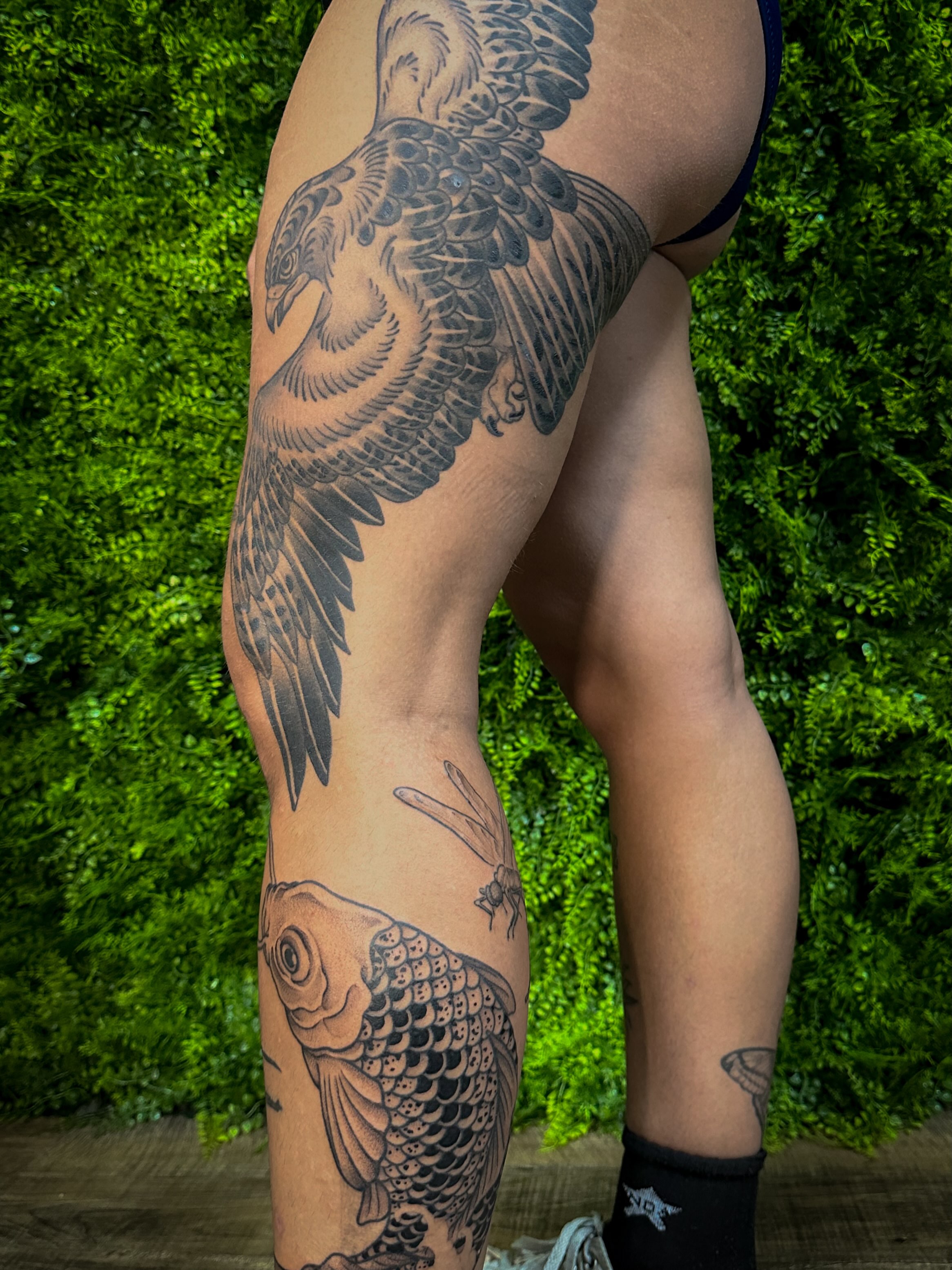 Bird and fish black and grey tattoo on the leg by 𝑰𝒍𝒍𝒖𝒔𝒕𝒓𝒂𝒕𝒊𝒗𝒆 𝑵𝒂𝒕𝒖𝒓𝒆 𝑻𝒂𝒕𝒕𝒐𝒐 𝑨𝒓𝒕𝒊𝒔𝒕