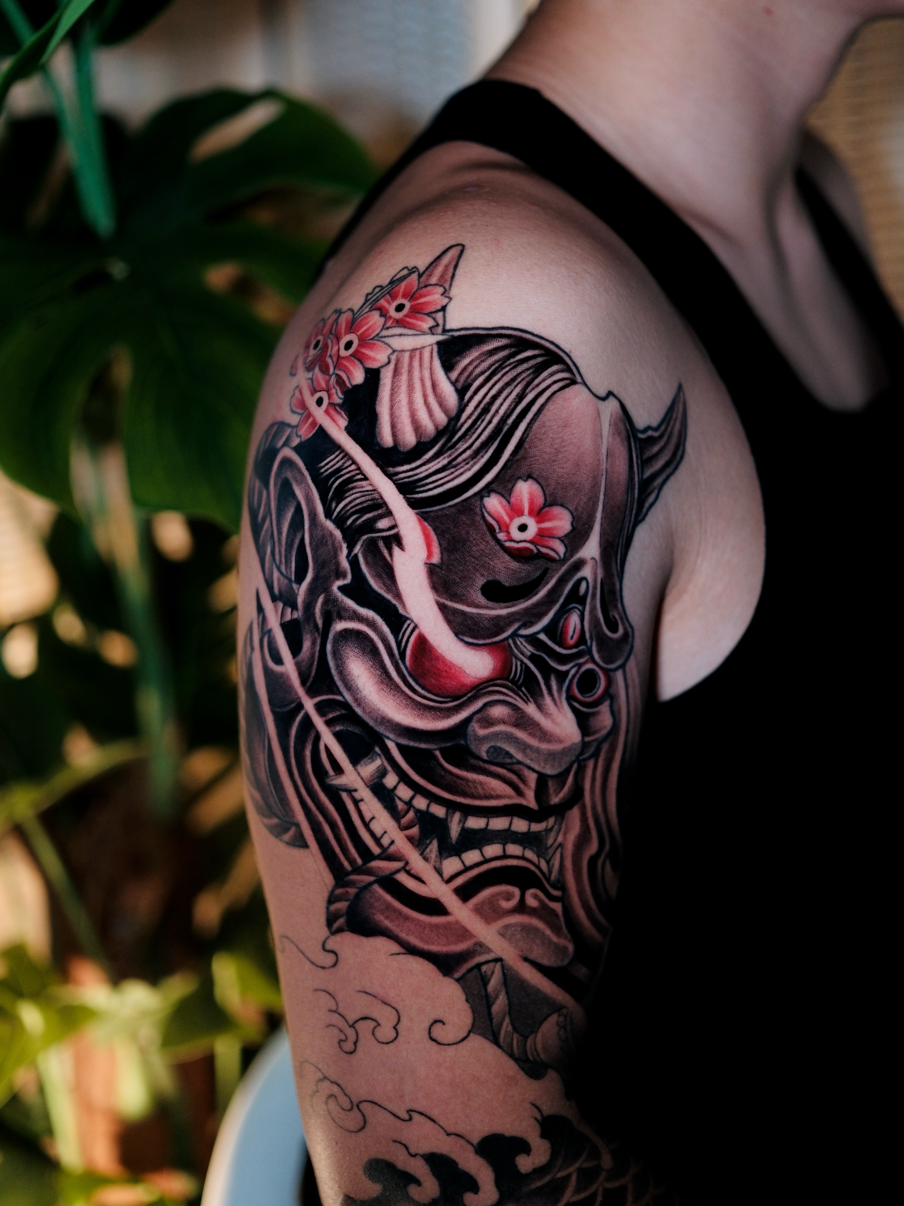 Demon mask with flowers japanese irezumi tattoo on the shoulder by Anh Nguyen