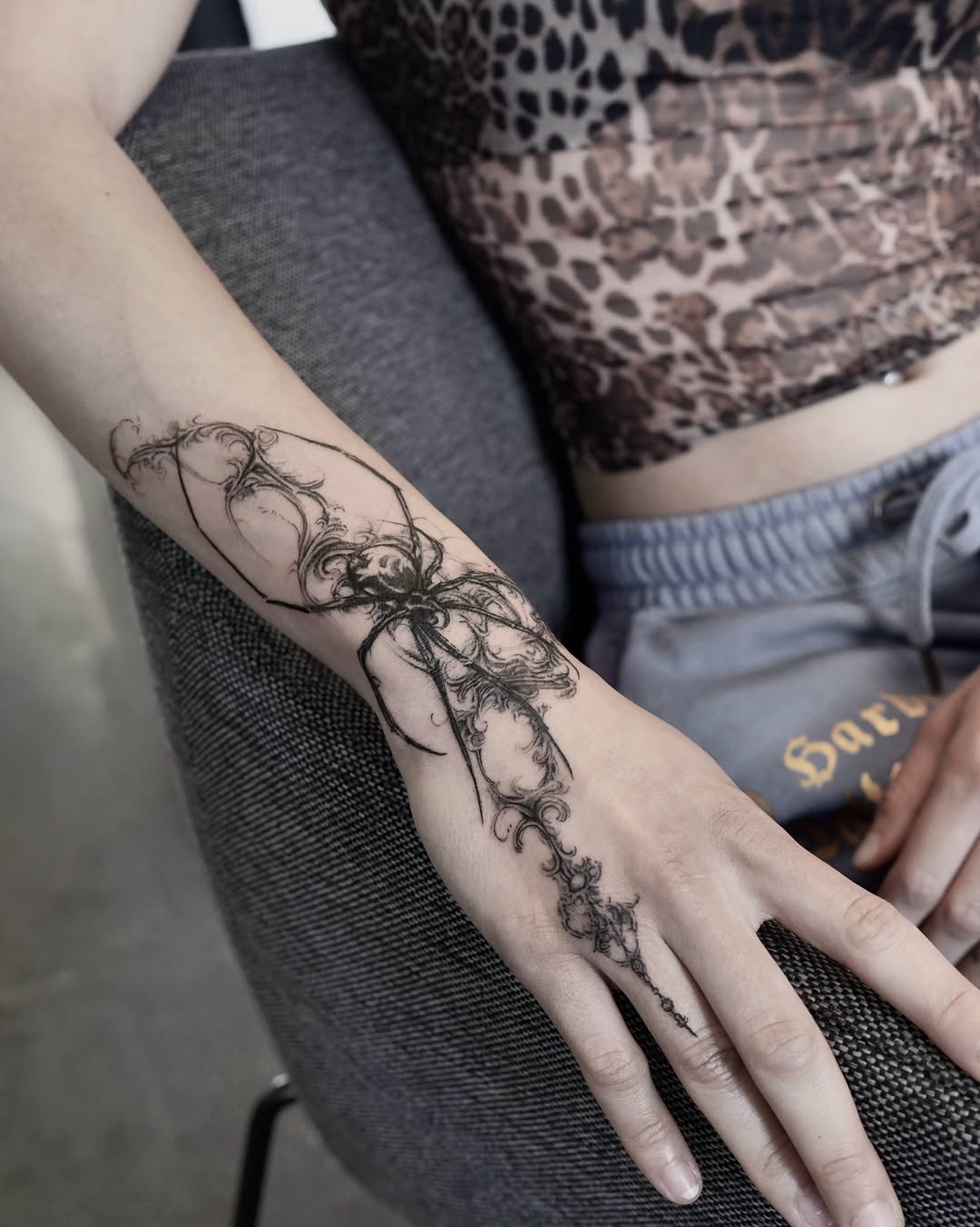 Spider black and grey tattoo on the forearm by @ashencoil