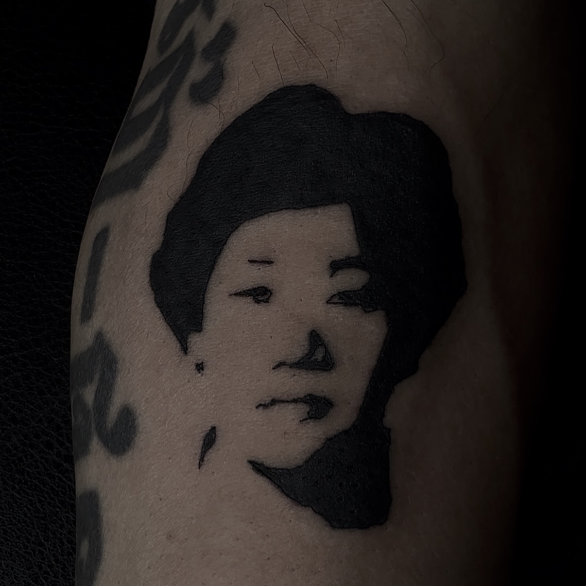 Portrait black and grey tattoo on the forearm by Jordan Sandoval