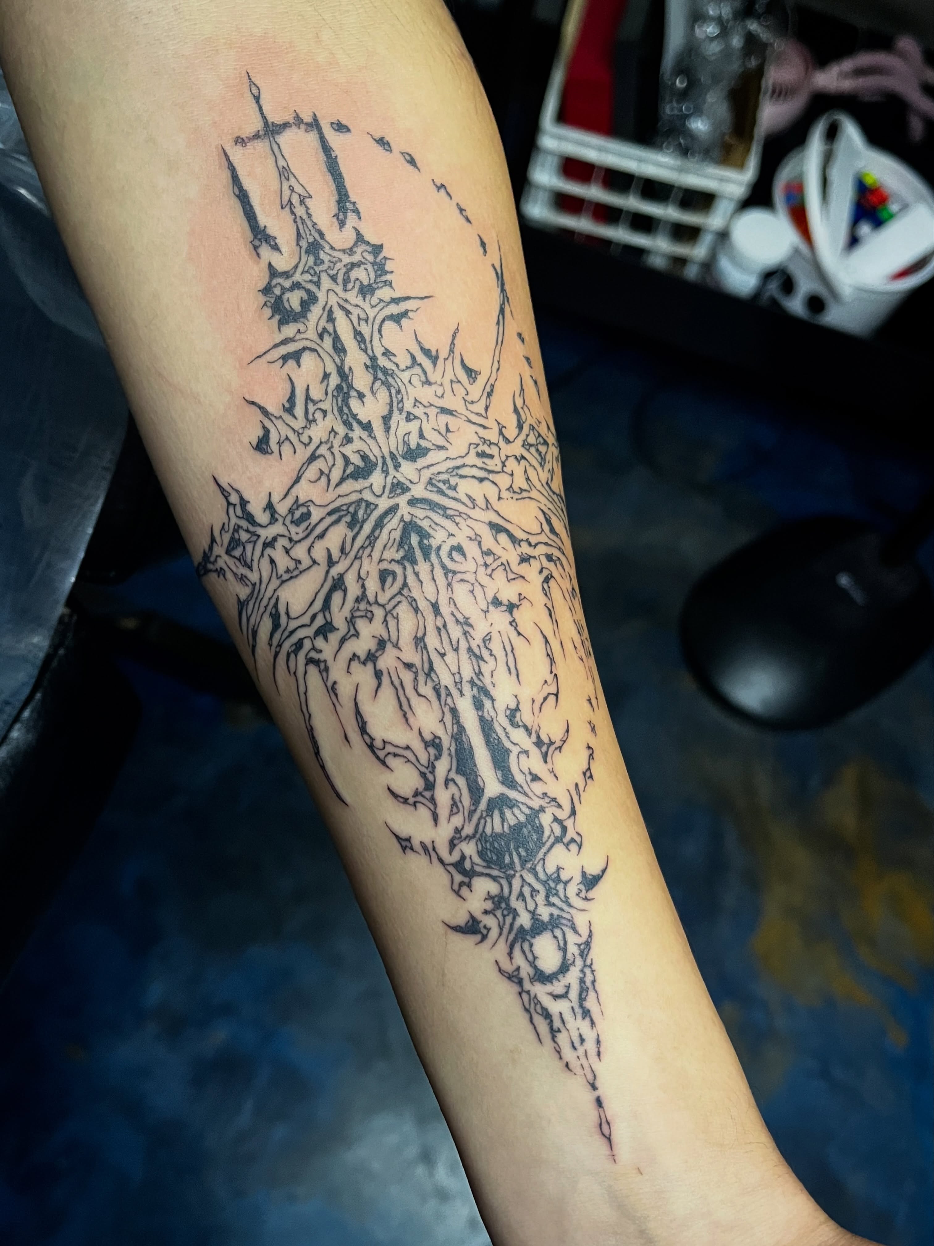 Abstract tree black and grey tattoo on the forearm by Sid
