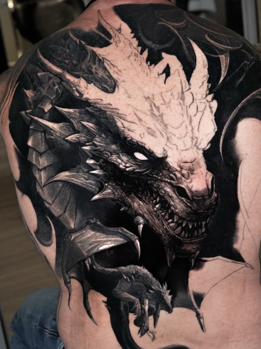 Dragon realism tattoo on the back by Kasey Gonzalez, Bel Air, Maryland