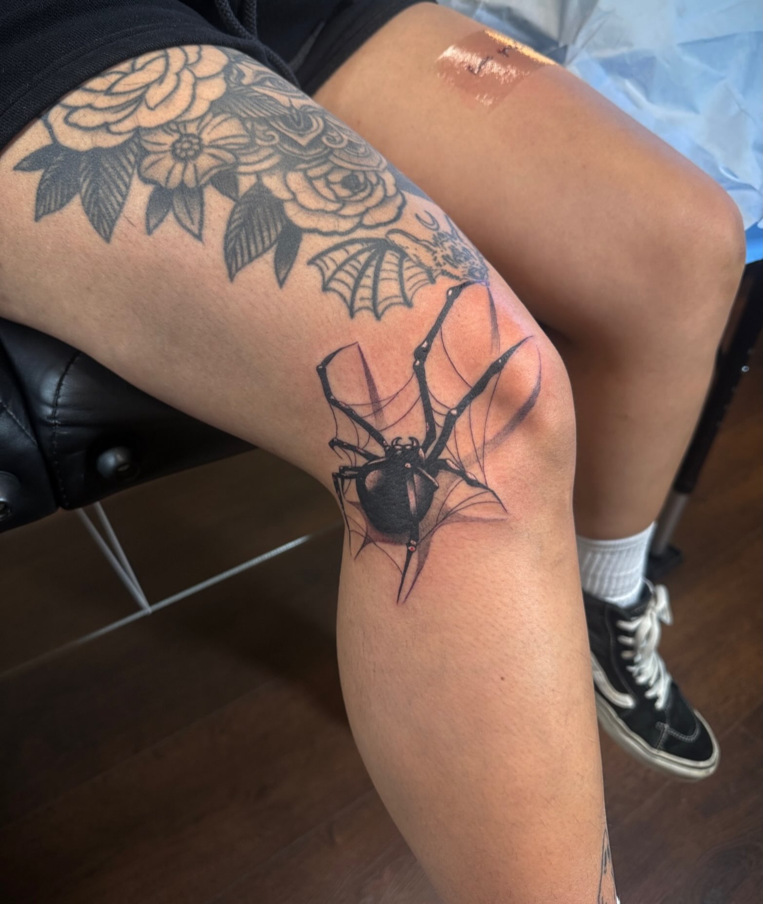 Spider and web realism tattoo on the thigh by Sad Girl Tattoos